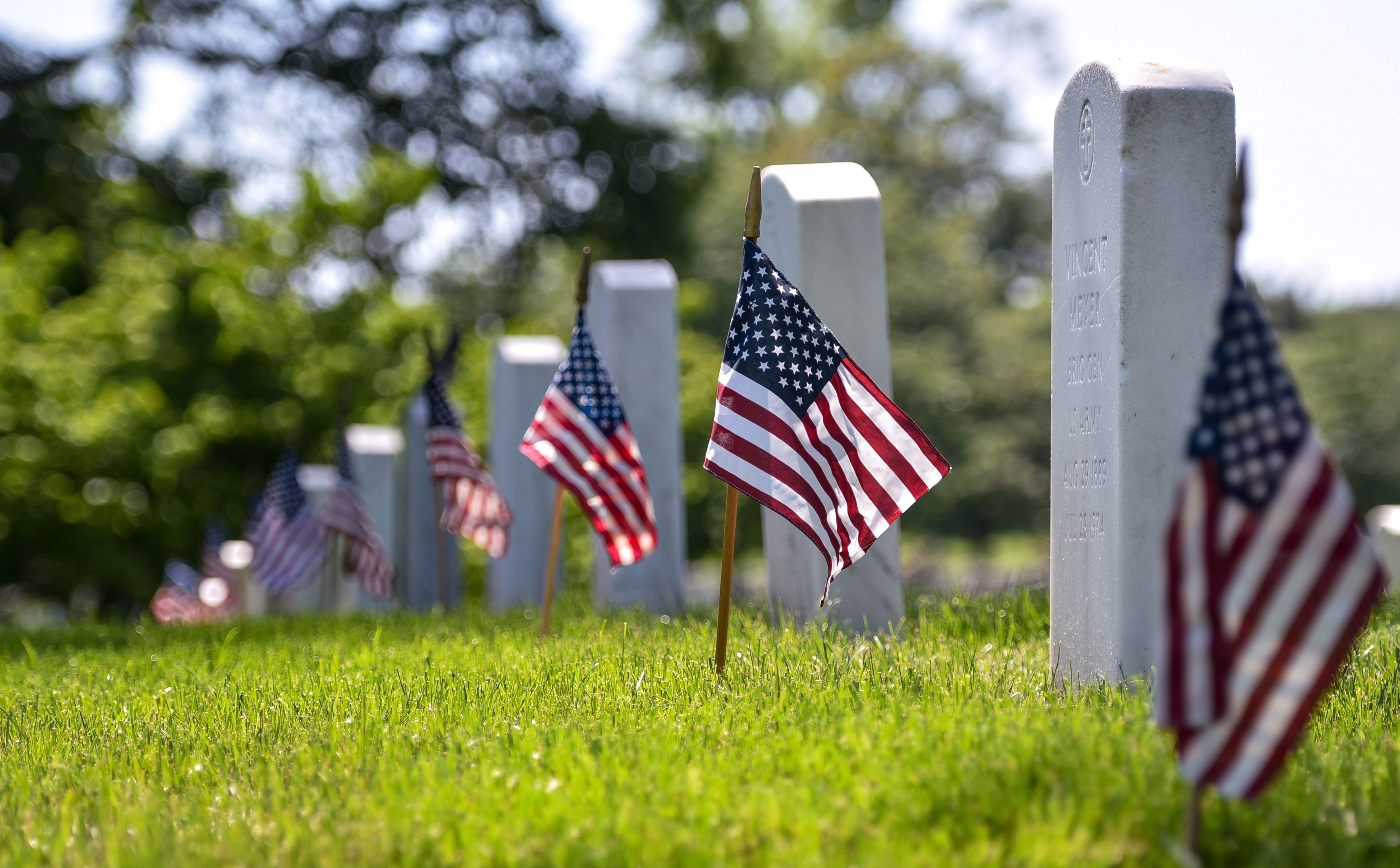 US flags are placed at graves at the Arlington National Cemetery on May 24, 2018. (Mandel Ngan&mdash;AFP/Getty Images)