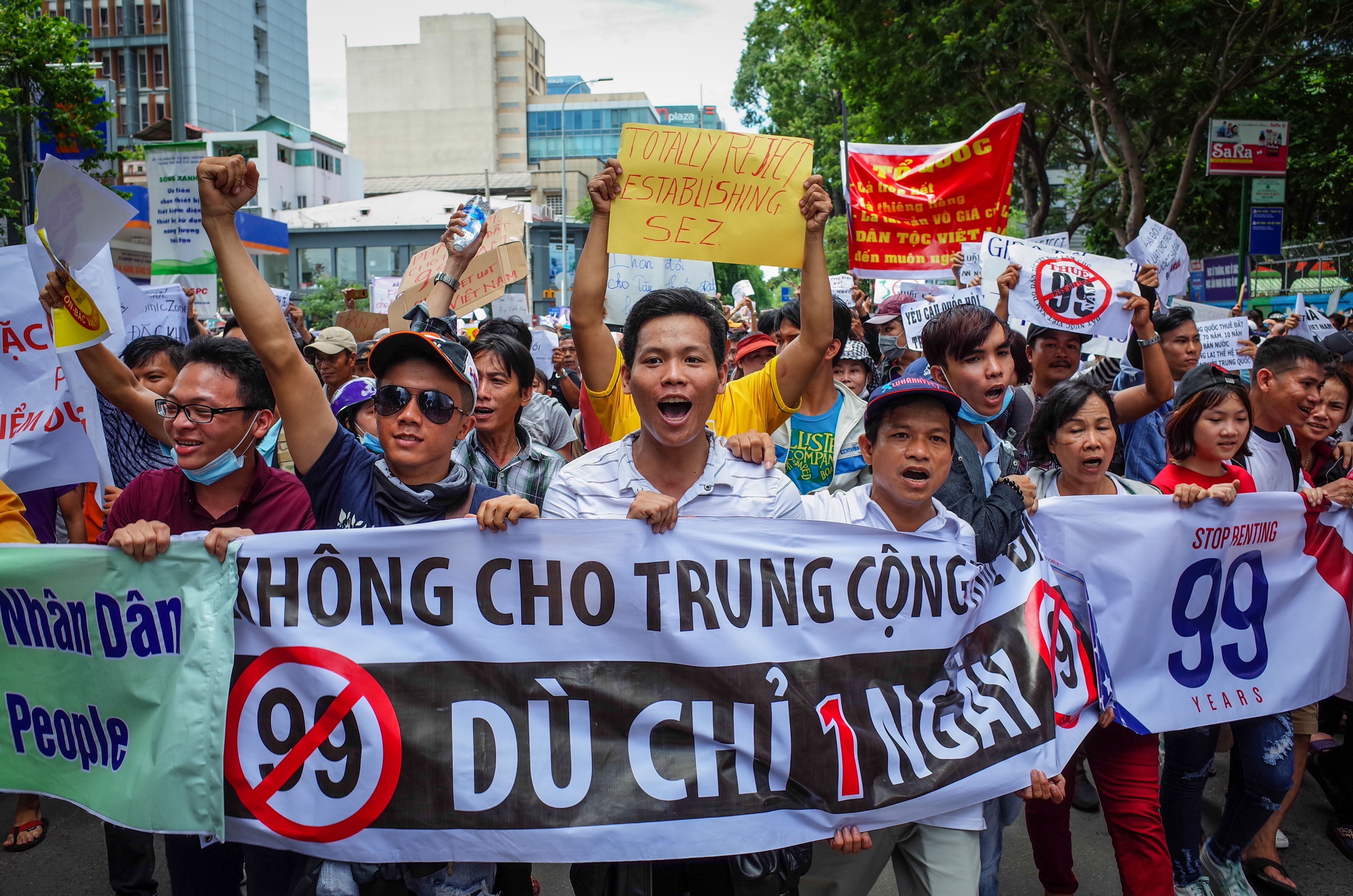 Vietnamese protesters shout slogans against a proposal to grant companies lengthy land leases during a demonstration in Ho Chi Minh City on June 10, 2018. (Kao Nguyen&mdash;AFP/Getty Images)