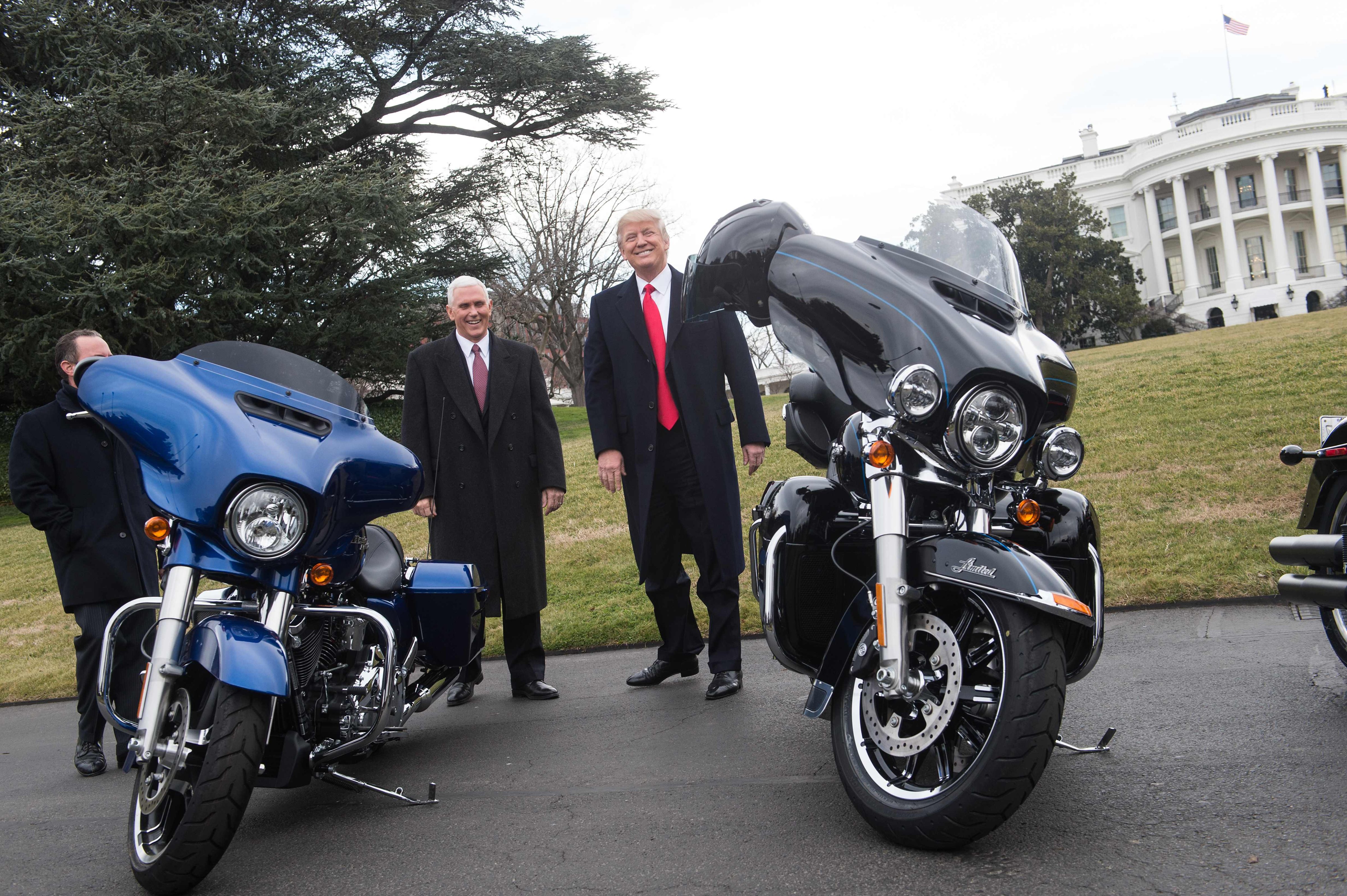 US President Donald Trump jokes with reporters after greeting Harley Davidson executives and union representatives on the South Lawn of the White House in Washington, DC, on February 2, 2017 prior to a luncheon with them. (Nicholas Kamm - AFP/Getty Images)