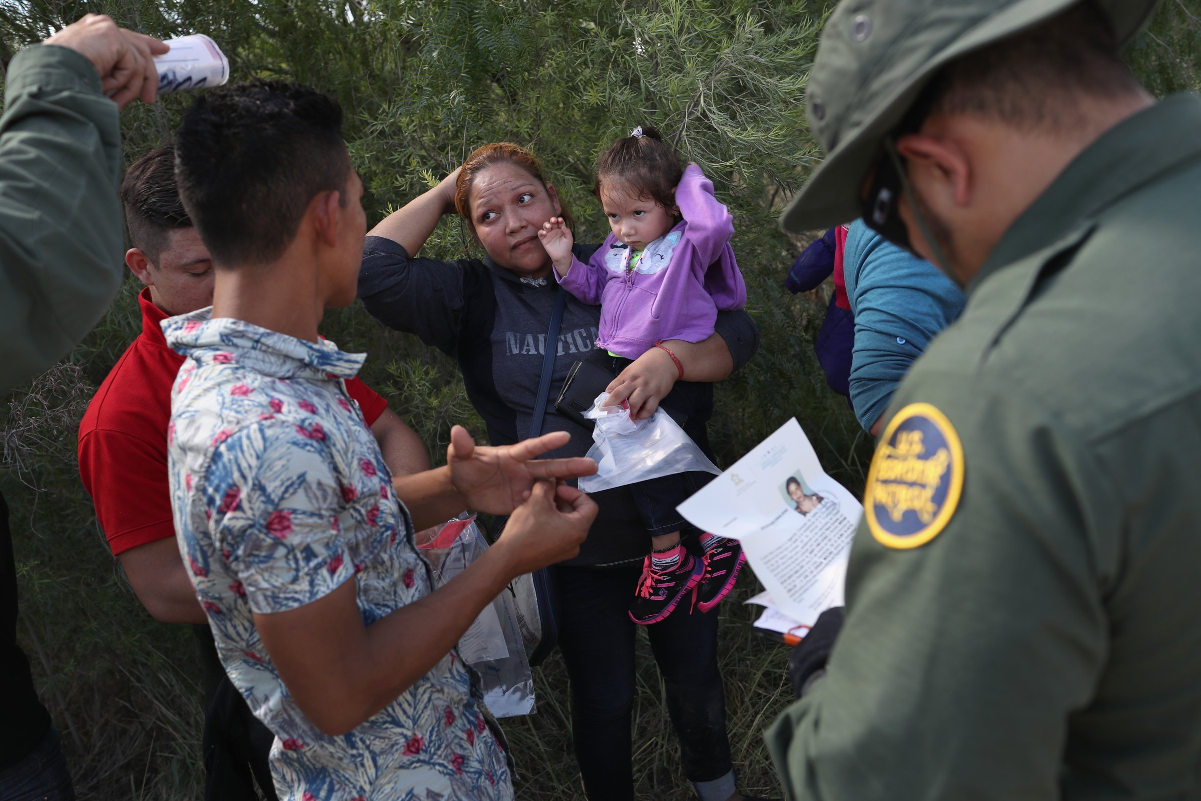 Border Patrol Agents Detain Migrants Near US-Mexico Border