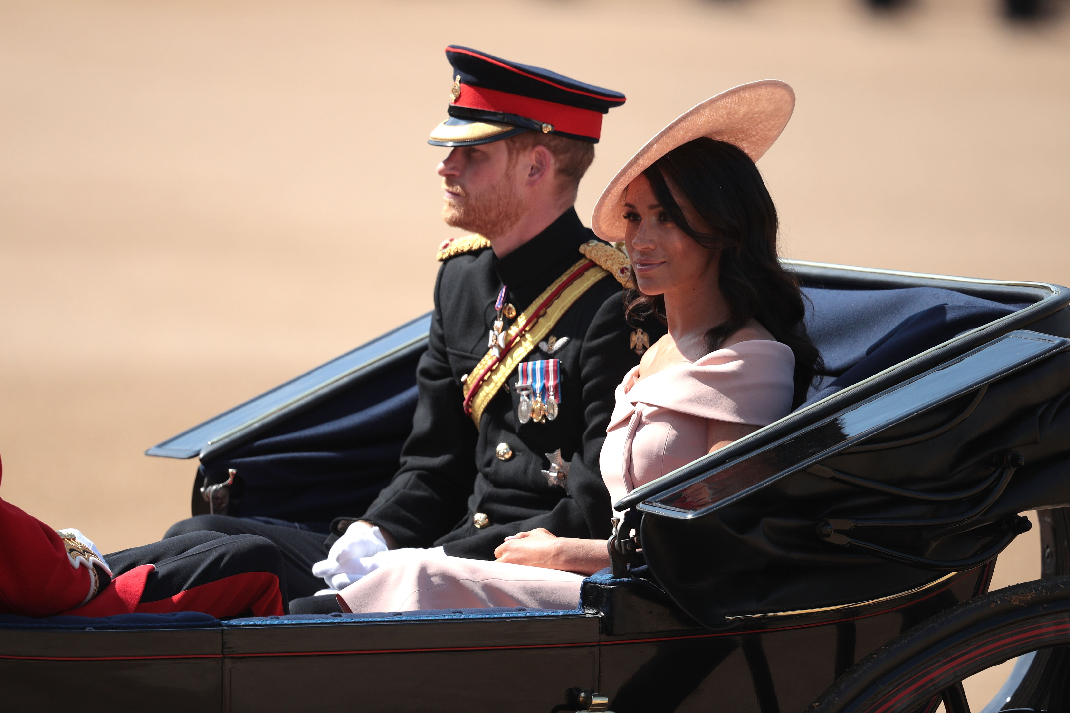 Prince Harry, Duke of Sussex, and Meghan Markle, Duchess of Sussex, arrive at The Royal Horseguards during Trooping the Colour ceremony on June 9, 2018 in London, England (Dan Kitwood—Getty Images)