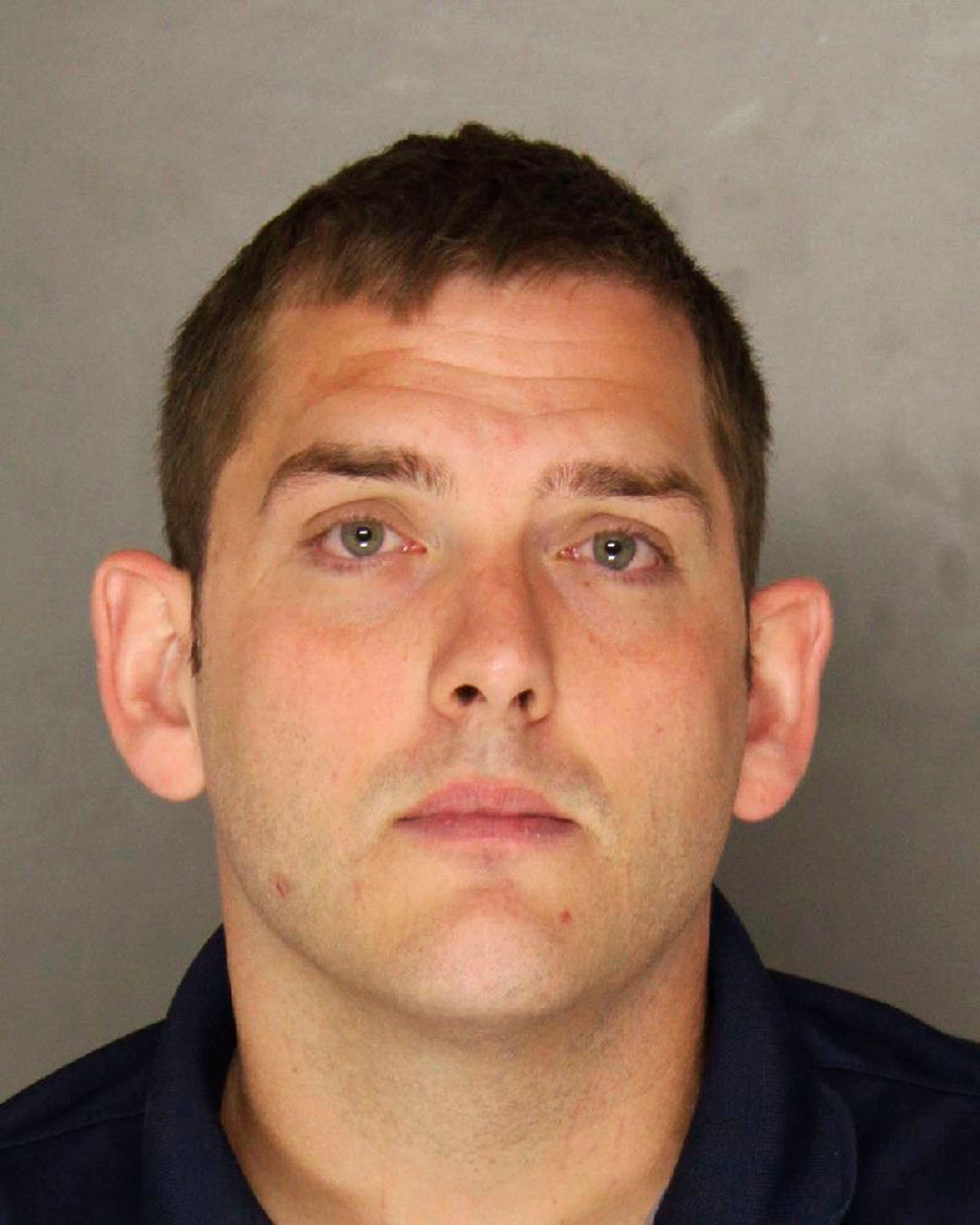 This undated photo provided by the Allegheny County District Attorney shows Michael Rosfeld, an East Pittsburgh, Pa., police officer. Rosfeld was charged with homicide, in the shooting death of Antwon Rose Jr. after a traffic stop June 19 in East Pittsburgh (AP/REX/Shutterstock)