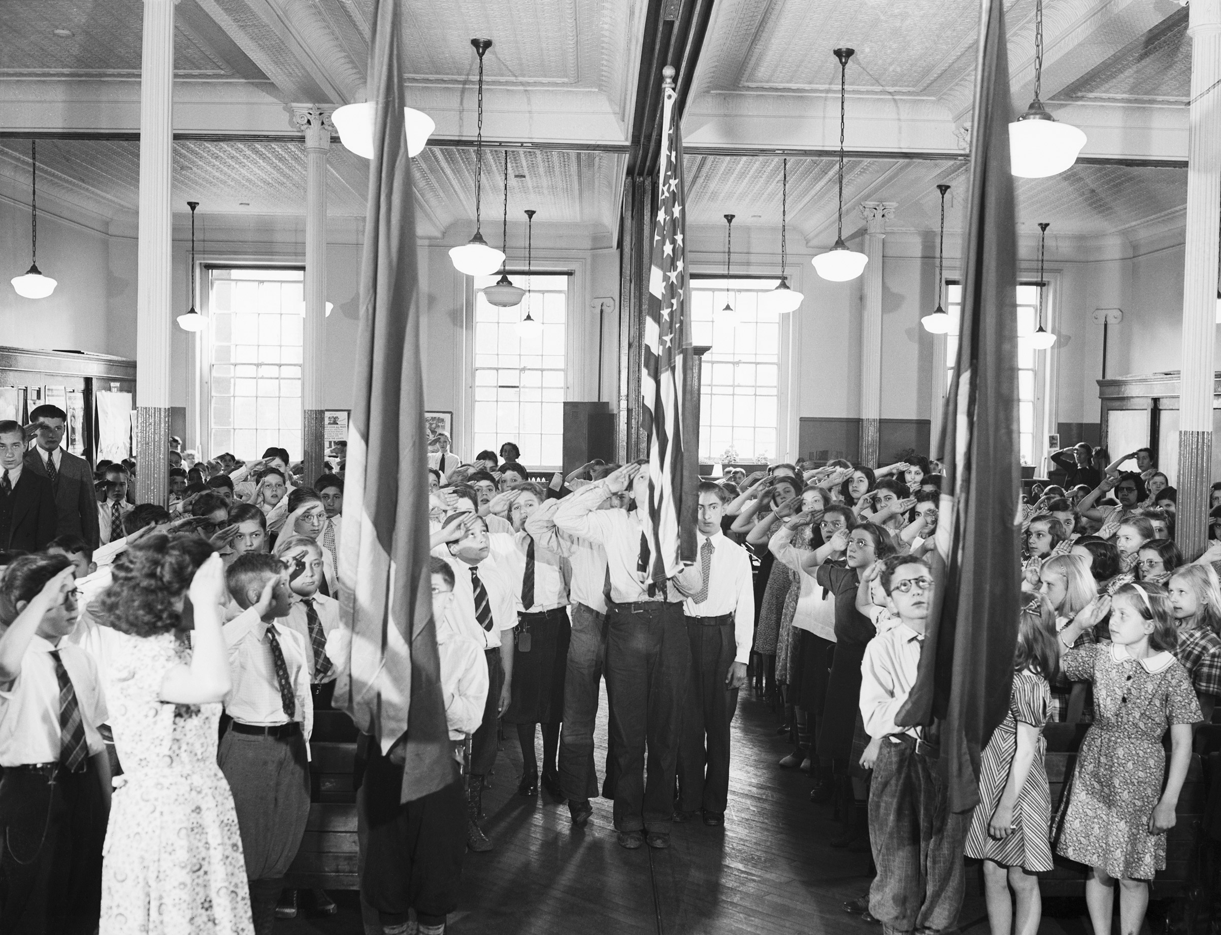 Students at P.S. #73 reciting the 'Pledge of Allegiance' on Jun. 1, 1938, in New York, N.Y. (Bettmann—Getty Images)