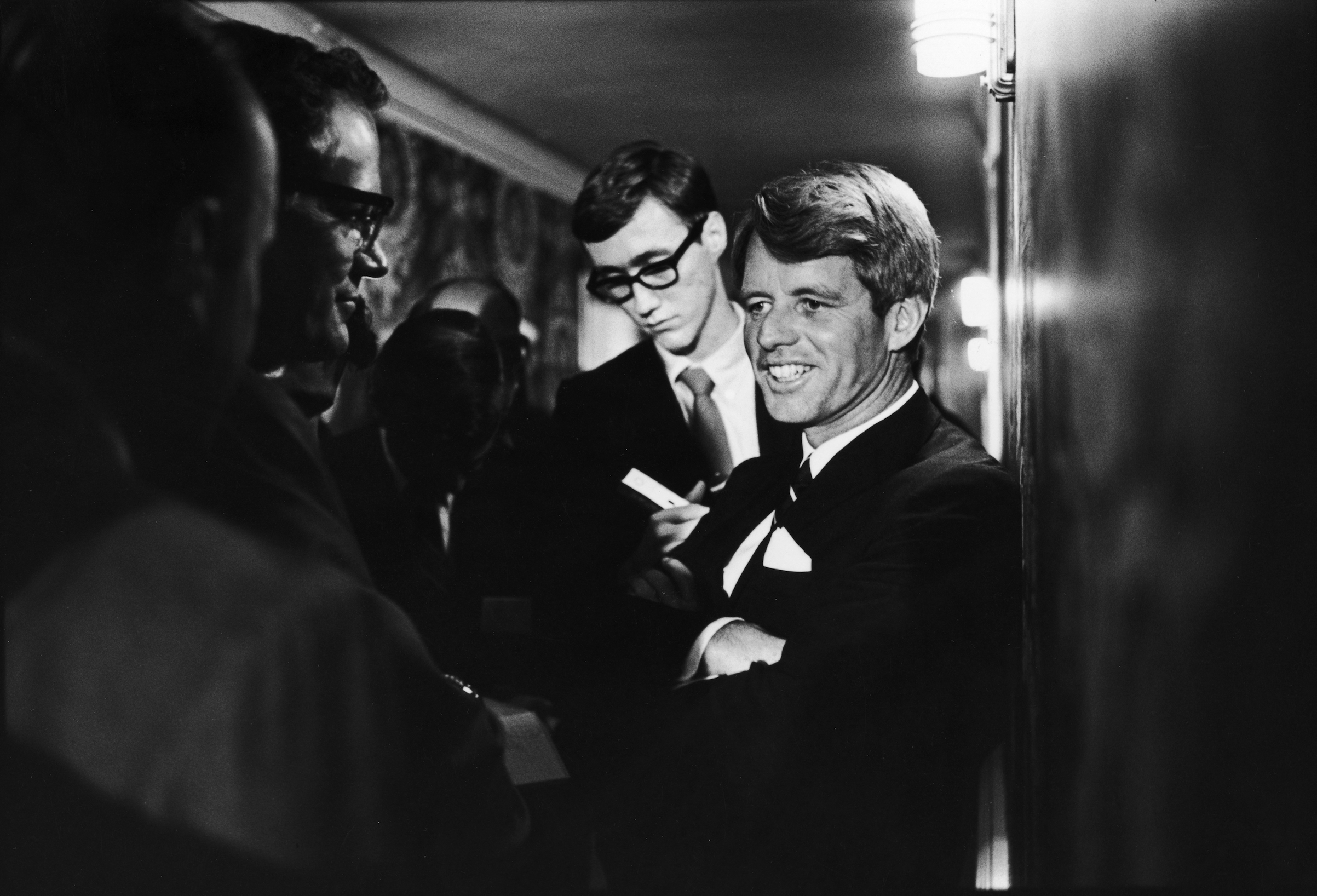 Robert Kennedy chats with reporters prior to his assassination at the Ambassador Hotel. Los Angeles, June 5, 1968 (Bill Eppridge—The LIFE Picture Collection/Getty Images)