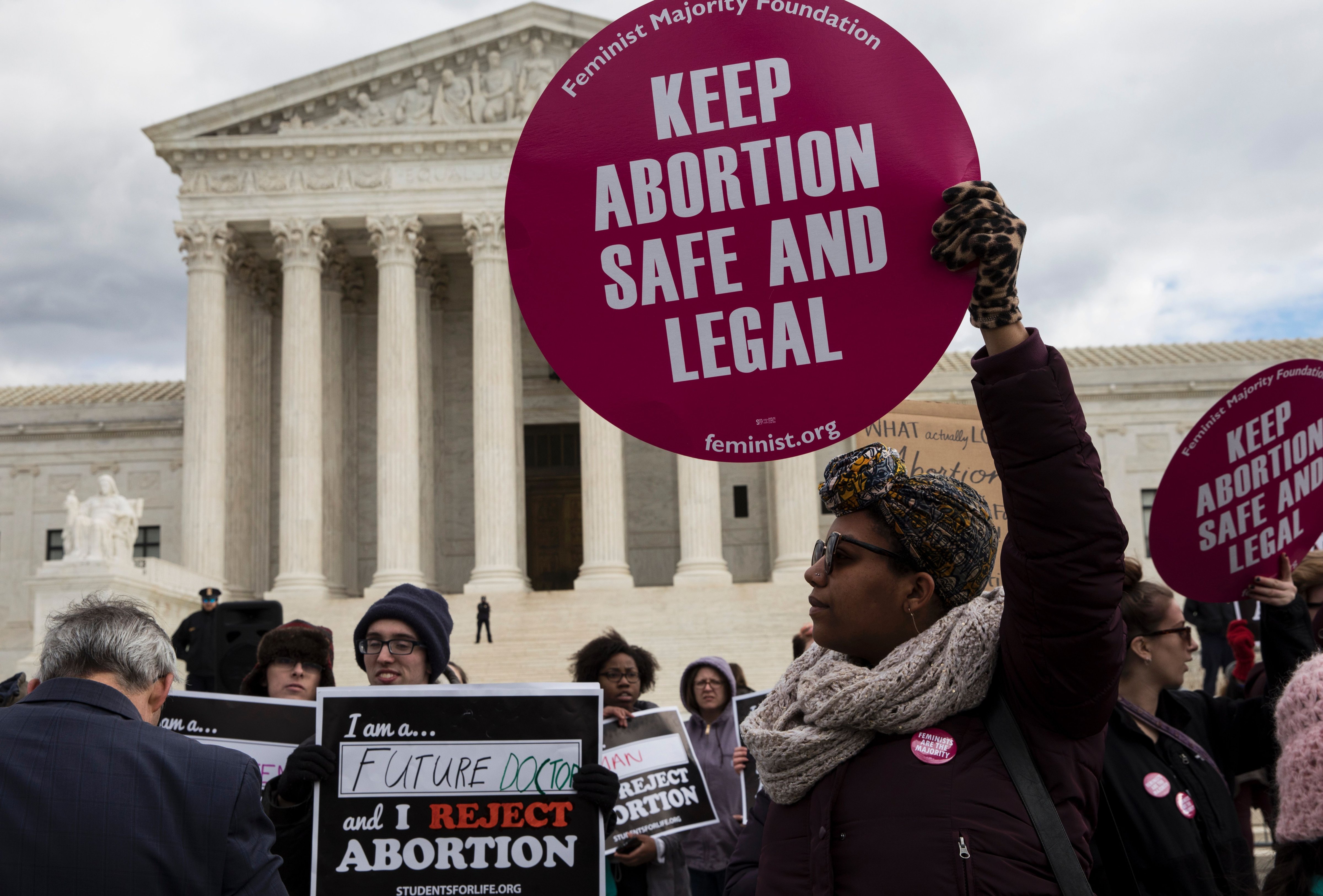 Abortion rights supporters and anti-abortion activists protest outside the U.S. Supreme Court during the 44th annual March for Life on January 27, 2017 in Washington, D.C. (Zach Gibson—AFP/Getty Images)