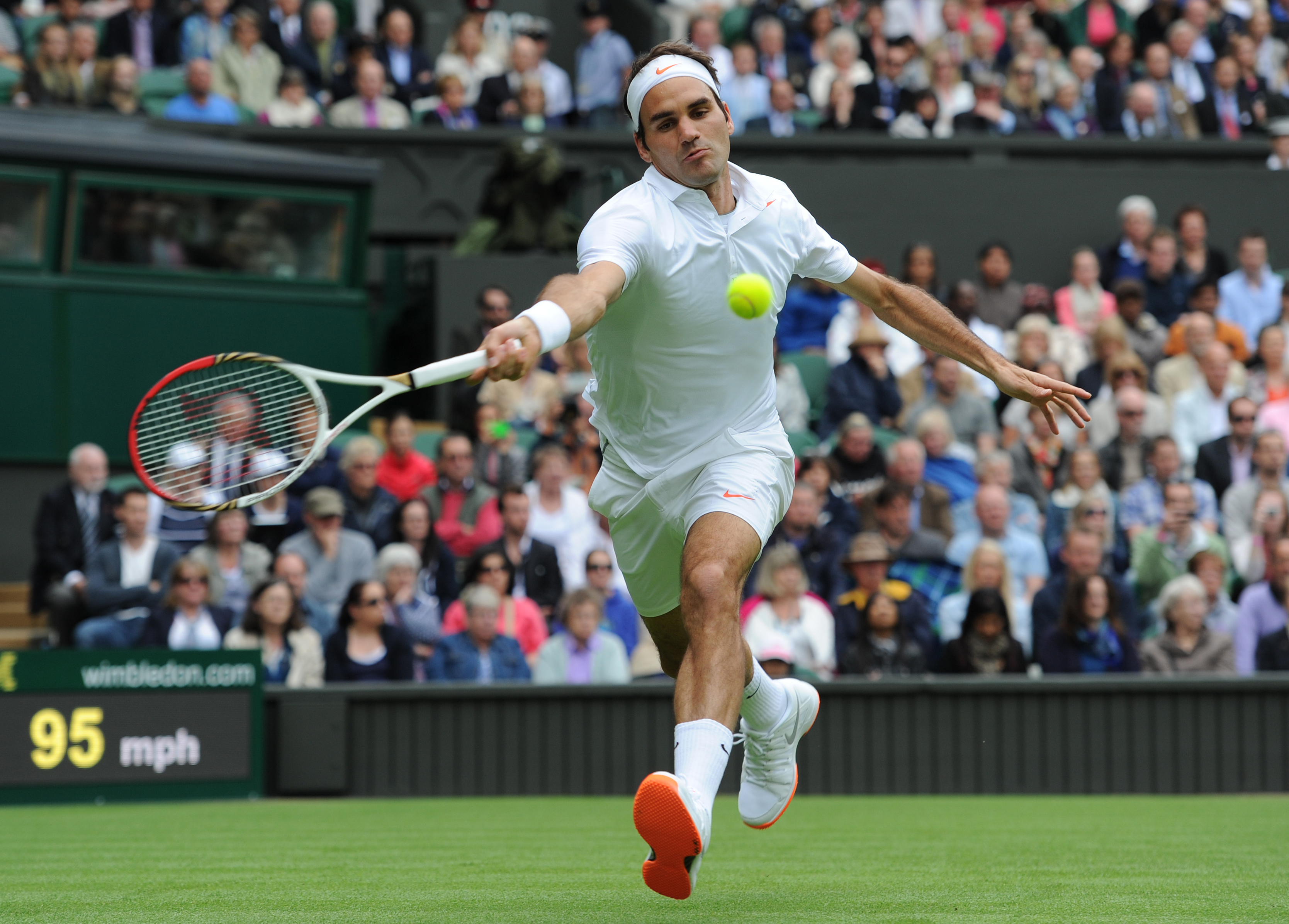Roger Federer of Switzerland during his first round match against Victor Hanescu of Romania of on Day One of the 2013 Wimbledon Tennis Championships at the All England Lawn Tennis and Croquet Club in London, United Kingdom. (Visionhaus—Corbis via Getty Images)