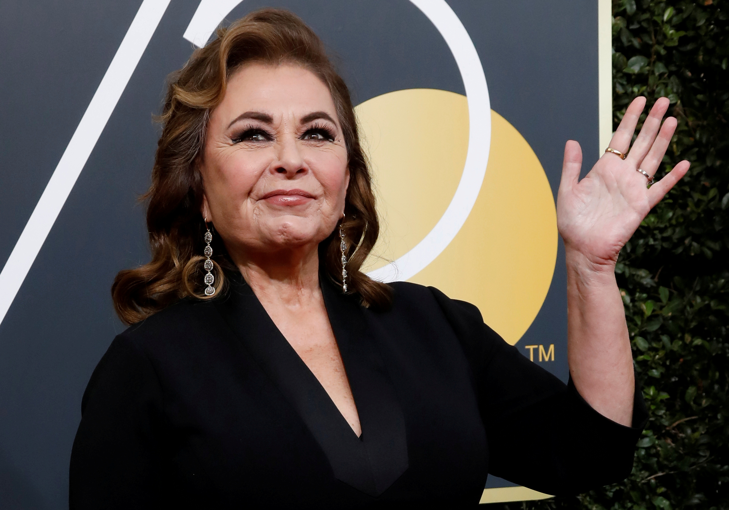 Actress Roseanne Barr waves on her arrival to the 75th Golden Globe Awards in Beverly Hills, Calif.,  on Jan. 7, 2018. (Mario Anzuoni—Reuters)