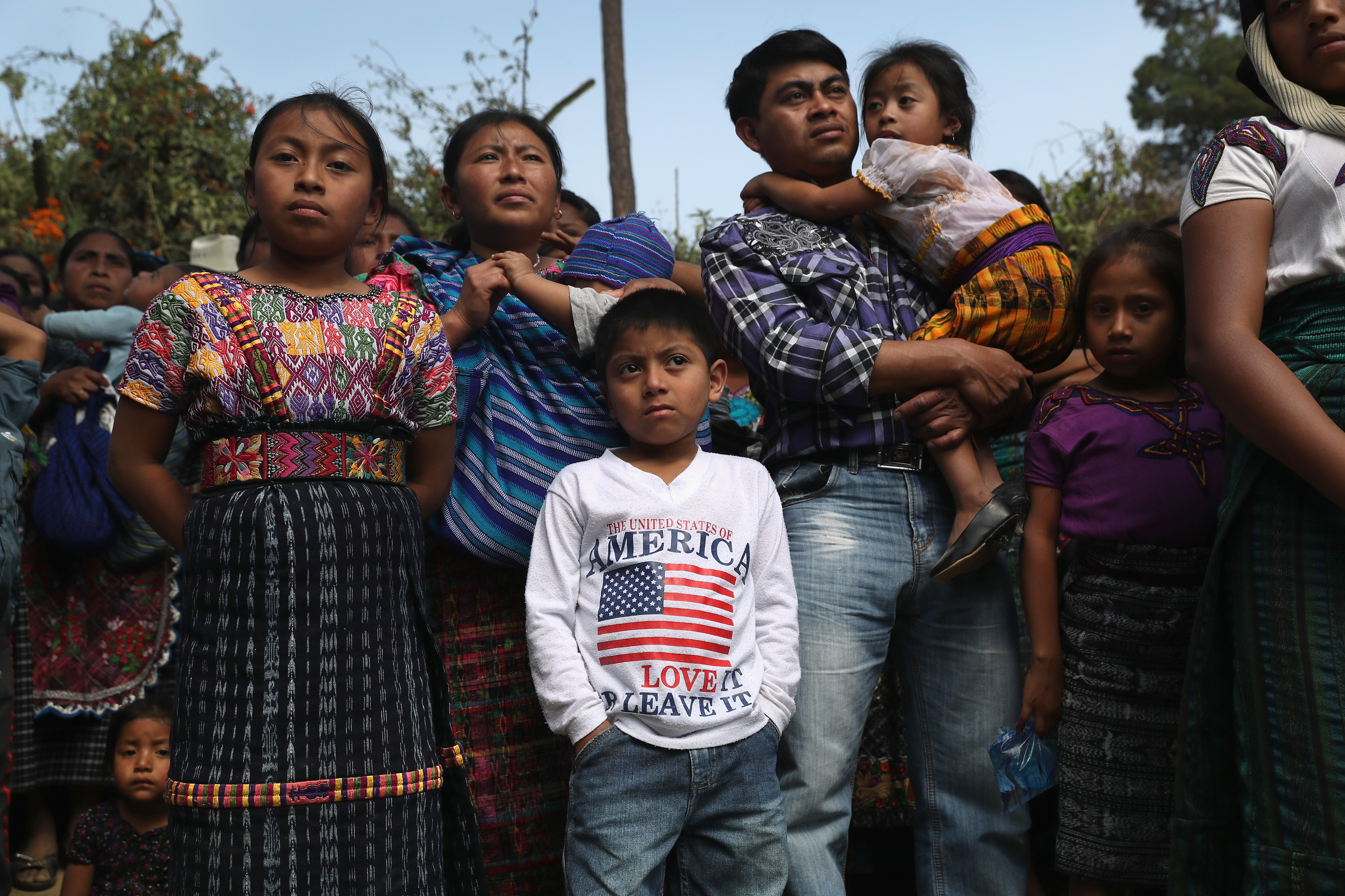 Families attend a memorial service for two boys who were kidnapped and killed in San Juan Sacatepequez, Guatemala on Feb. 14, 2017. More than 2,000 people walked in a funeral procession for Oscar Armando Top Cotzajay, 11, and Carlos Daniel Xiqin, 10 who were abducted walking to school Friday morning when they were abducted. (John Moore—Getty Images)