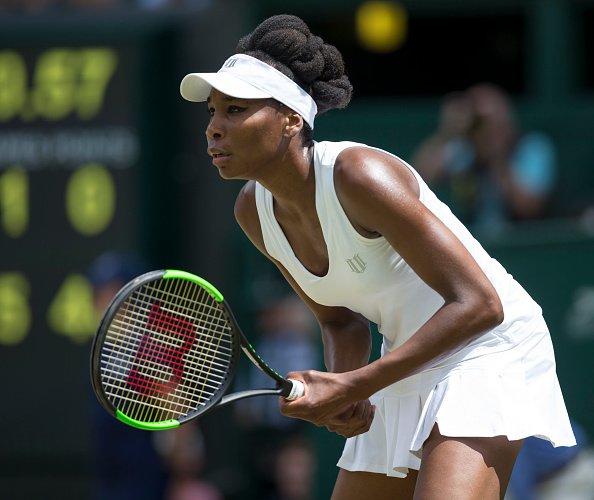 Venus Williams awaits a serve from Ana Konjuh at Wimbledon 2017. (Roland Harrison/Action Plus via Getty Images)