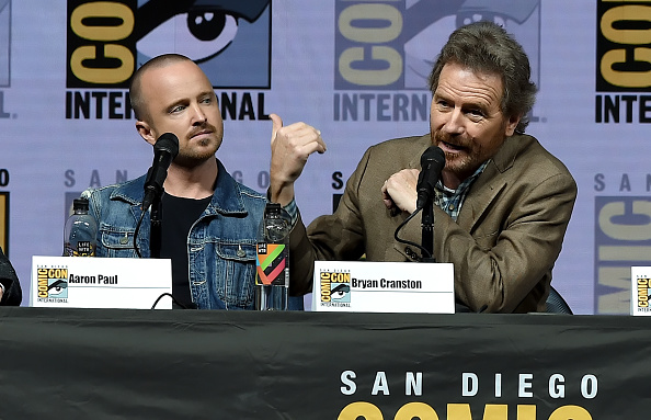 Aaron Paul (L) and Bryan Cranston speak onstage during the 'Breaking Bad' 10th Anniversary Celebration during Comic-Con International 2018 on July 19, 2018 in San Diego, California. (Kevin Winter/Getty Images)