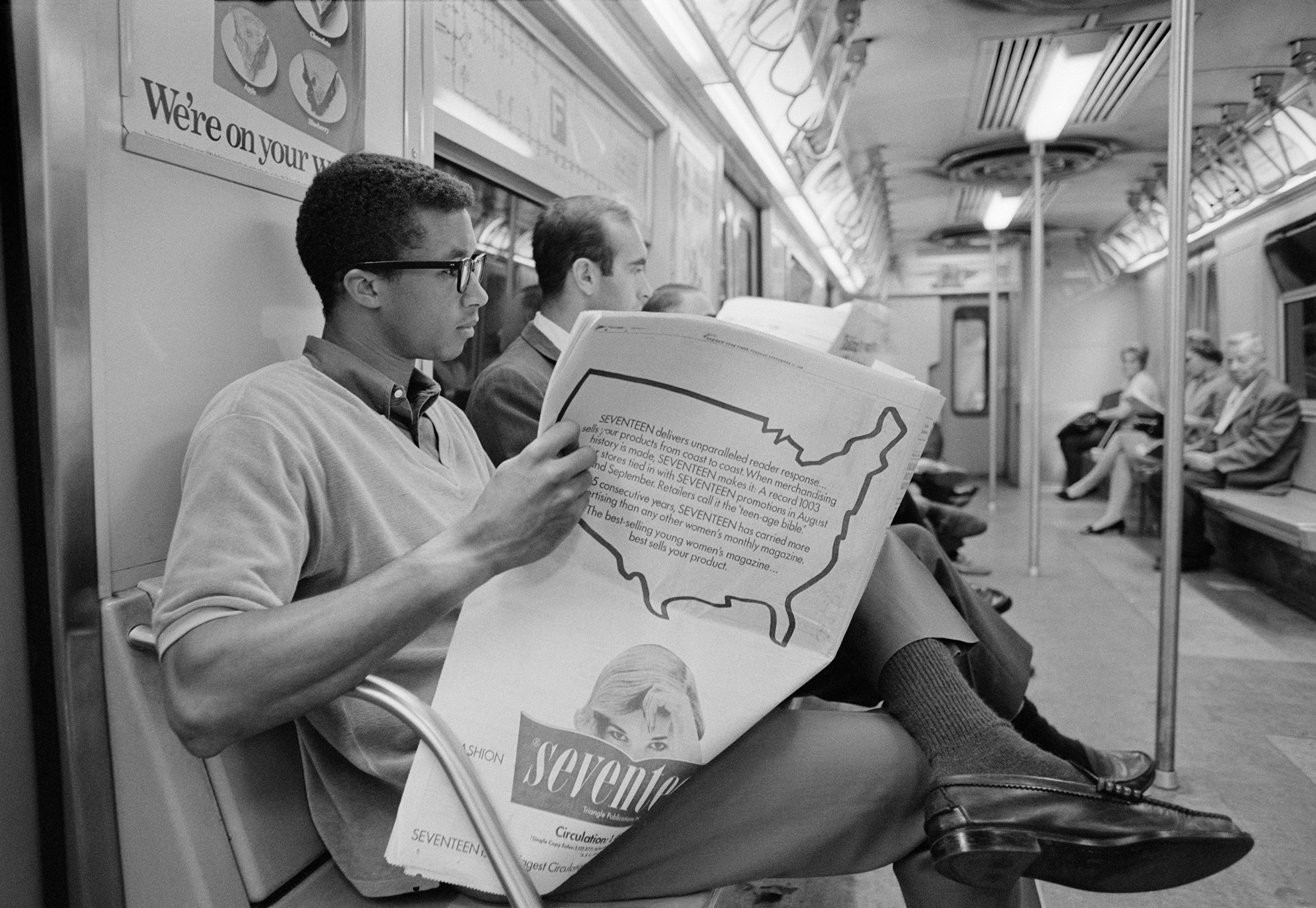 Arthus Ashe takes the New York City subway, unrecognized the day after winning the US Open Men's Singles Championship. September 10, 1968. Photo by John G. Zimmerman.