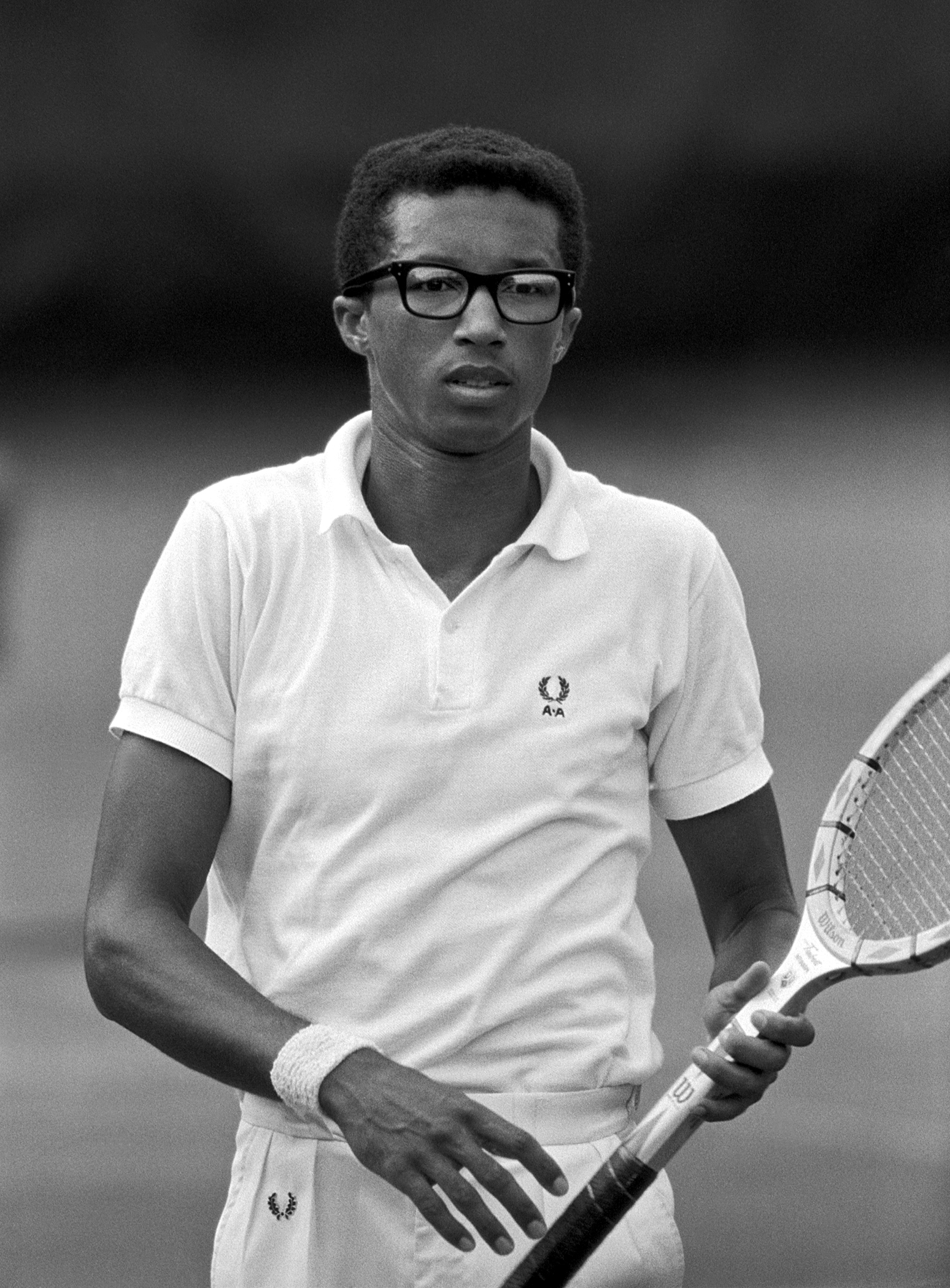 American tennis player Arthur Ashe (1943 - 1993) playing in the US Open final against Tom Okker of the Netherlands. West Side Tennis Club, Forest Hills, New York, September 9, 1968. Photographer John G. Zimmerman