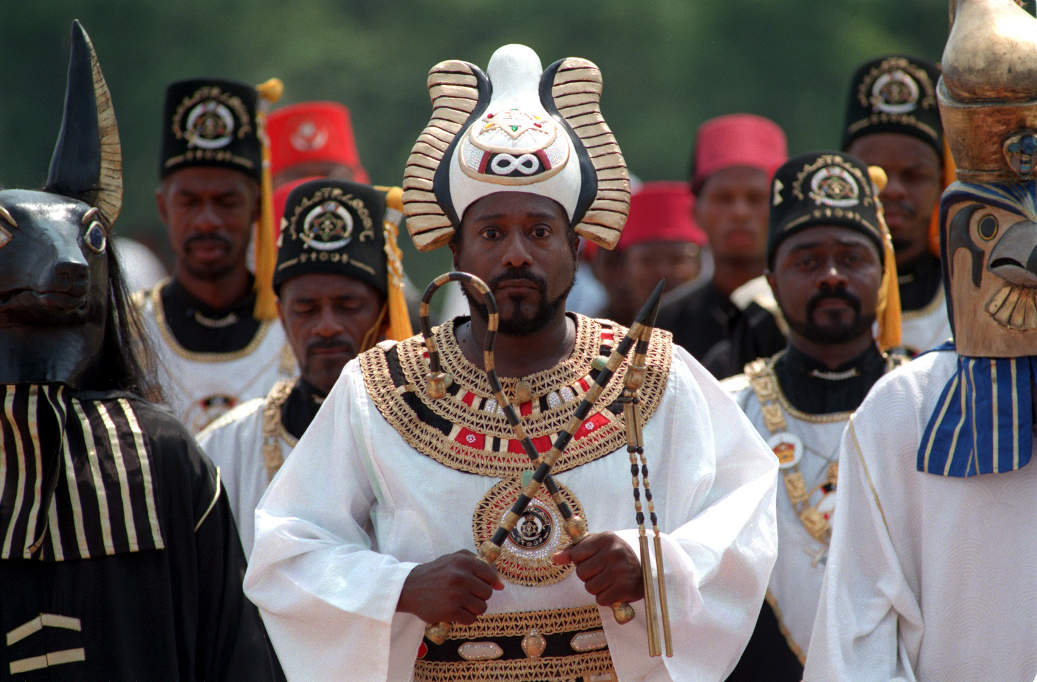 United Nations of Nuwaubians founder, Dr. 'Dwight' Malachi Z. York (cq), center, participates in the 'Procession of Osiris' at the farm in Putnam County near Eatonton during the Founders Day Festival on June 26, 1998. (W. A. Bridges Jr./Atlanta Journal-Constitution—AP)