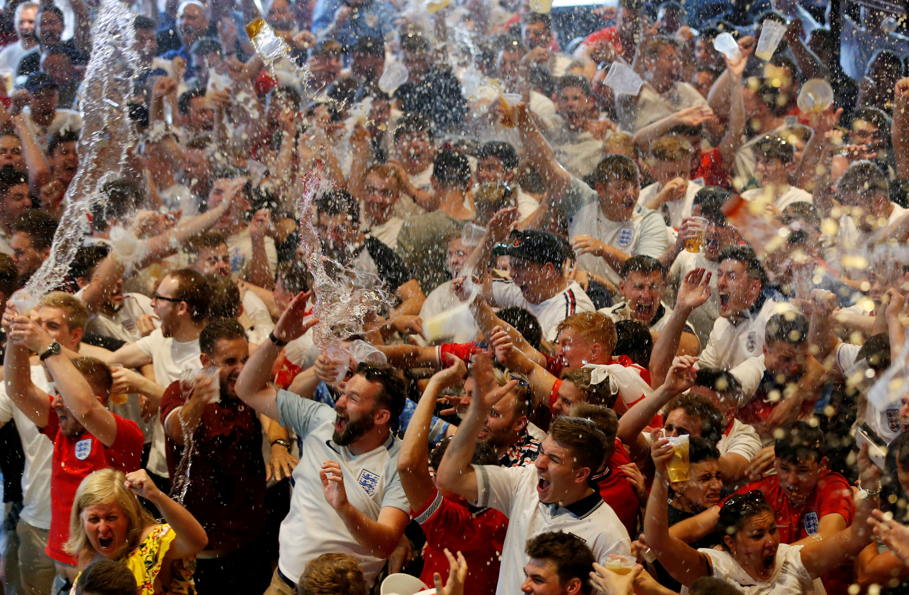 England fans celebrate during the Sweden vs. England game from Bristol, Britain on July 7, 2018. (Ed Sykes—Reuters)