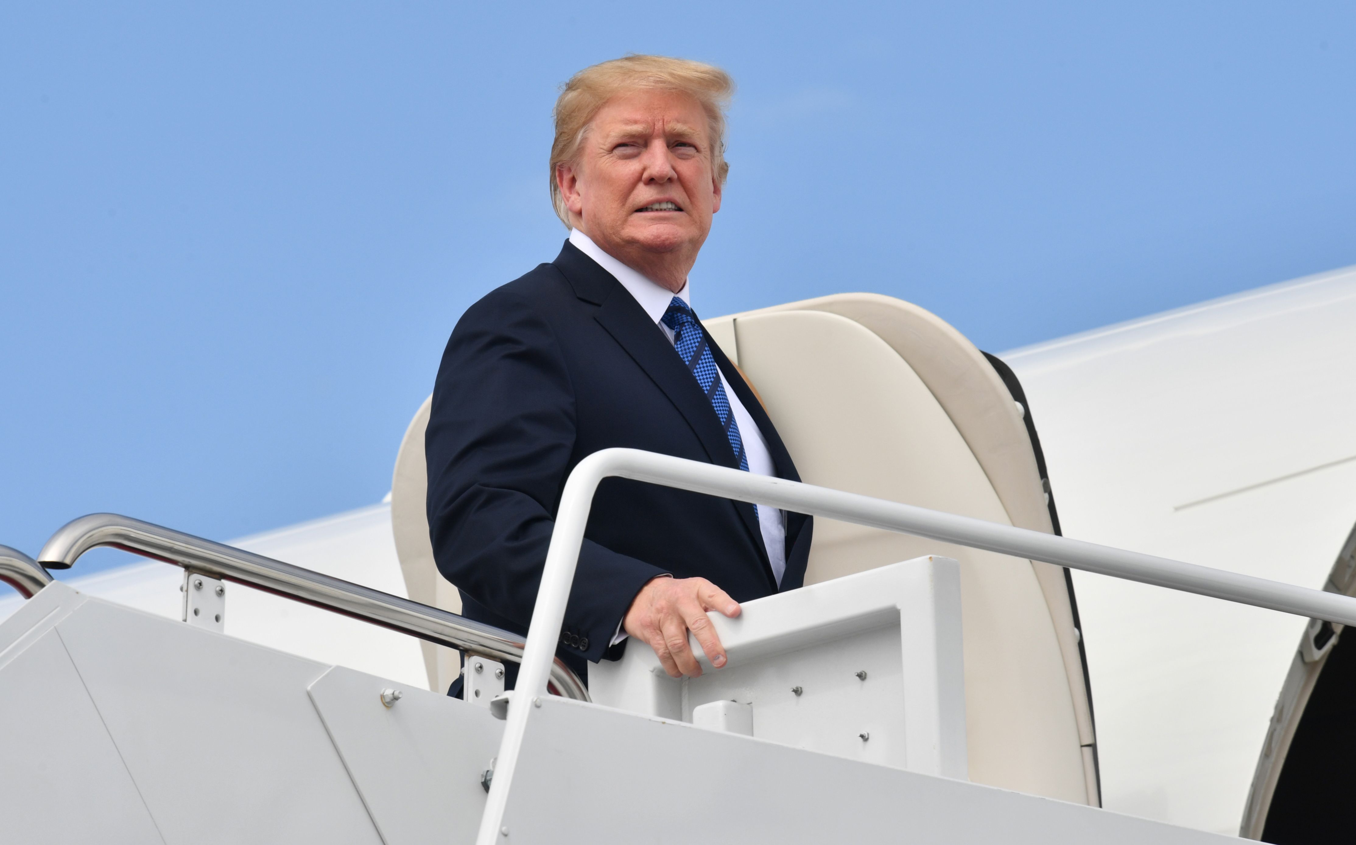 President Donald Trump as he boards Air Force One, July 20, 2018. (Nicholas Kamm—AFP/Getty Images)
