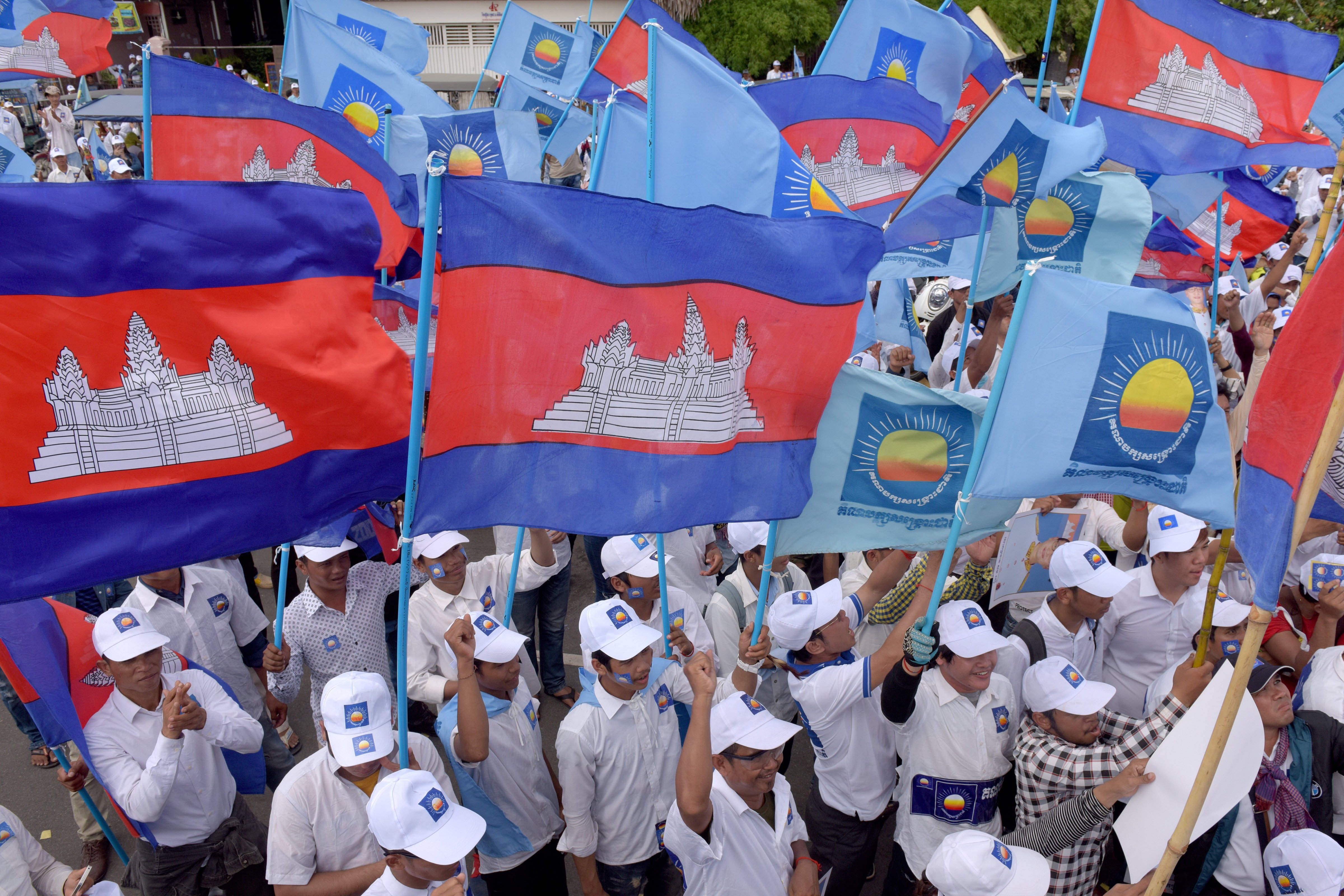Supporters of Cambodia National Rescue Party rally on the last day of the commune election campaign in Phnom Penh on June 2, 2017. (Tang Chhin Sothy—AFP/Getty Images)