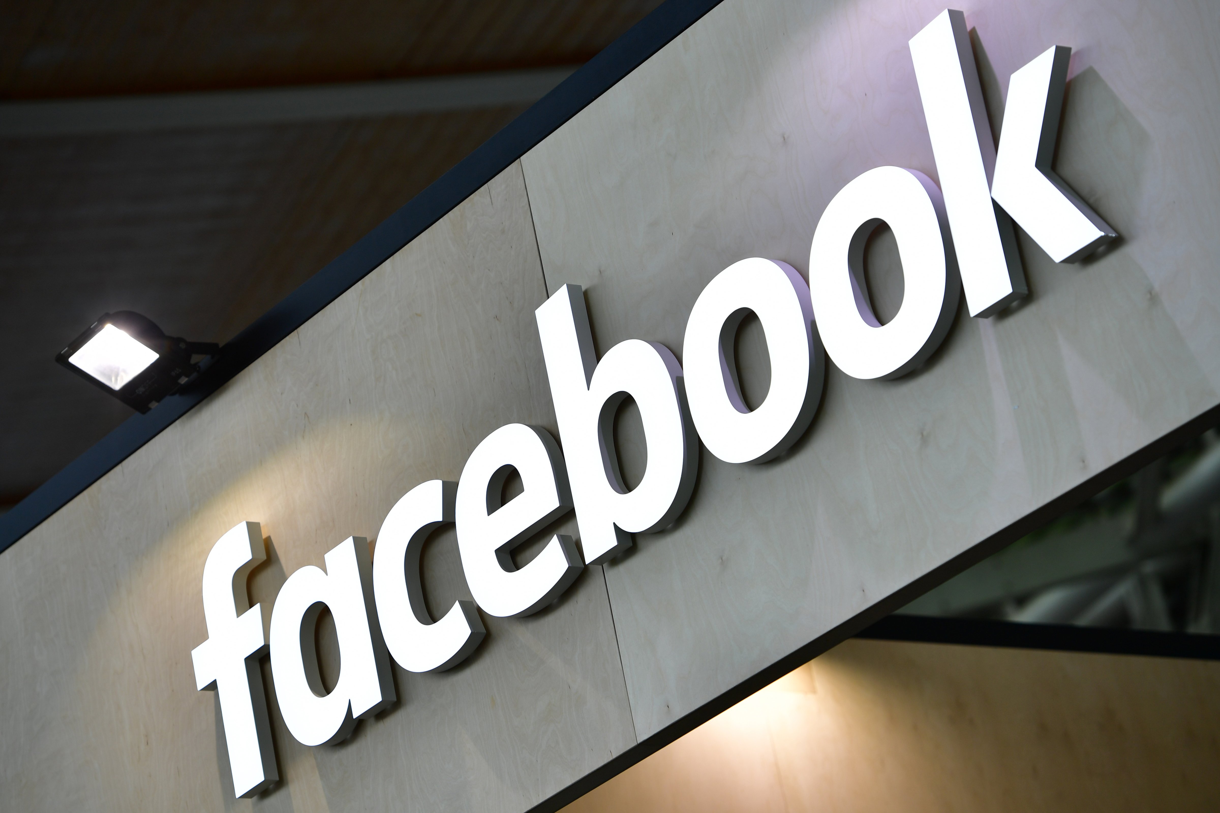The Facebook logo is displayed at the 2018 CeBIT technology trade fair. (Alexander Koerner&mdash;Getty Images)