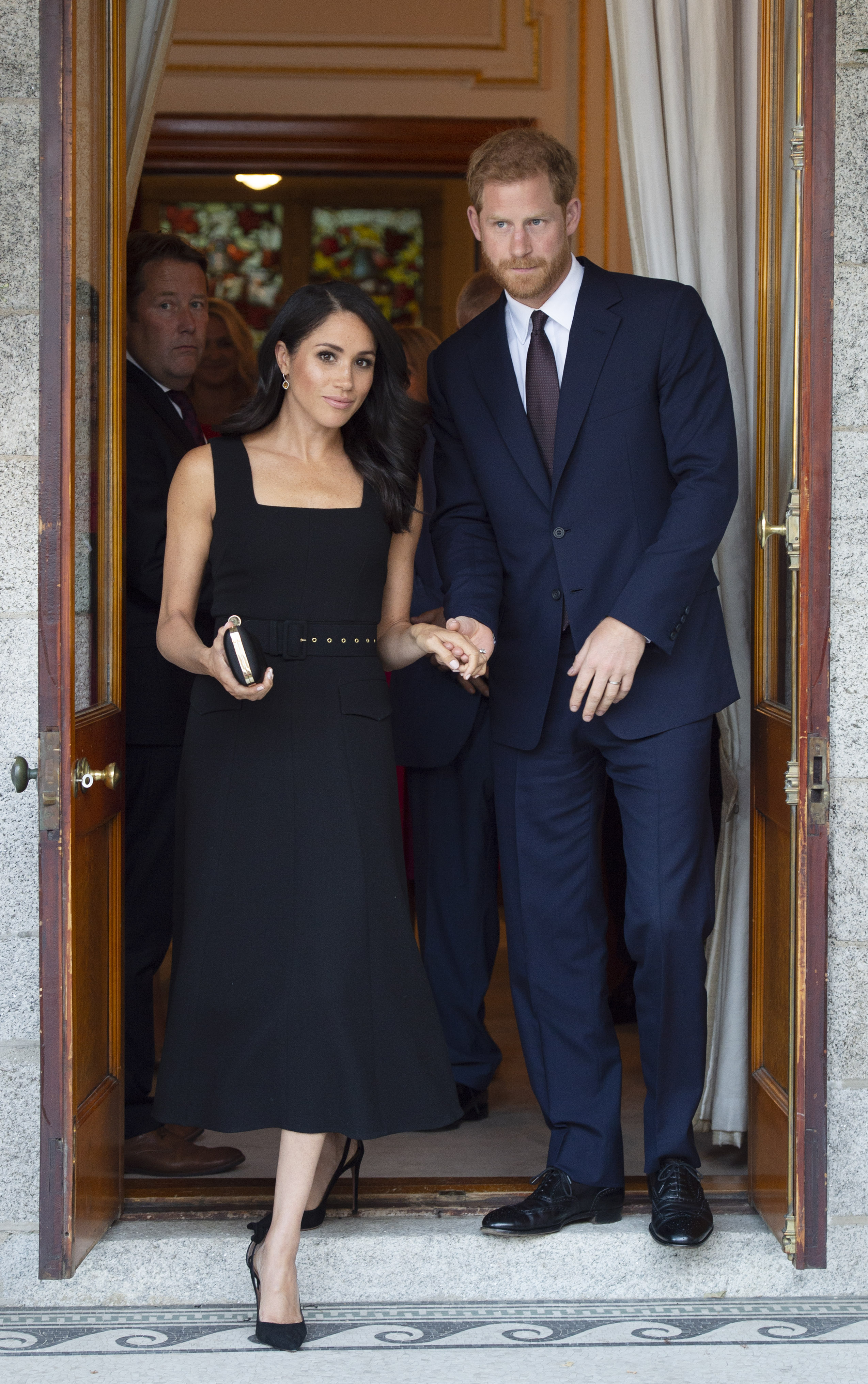 DUBLIN, IRELAND - JULY 10: Prince Harry, Duke of Sussex and Meghan, Duchess of Sussex attend a reception at Glencairn, the residence of Robin Barnett, the British Ambassador to Ireland during day one of their visit to Ireland on July 10, 2018 in Dublin, Ireland. (Photo by Geoff Pugh - WPA Pool/Getty Images) (WPA Pool—Getty Images)