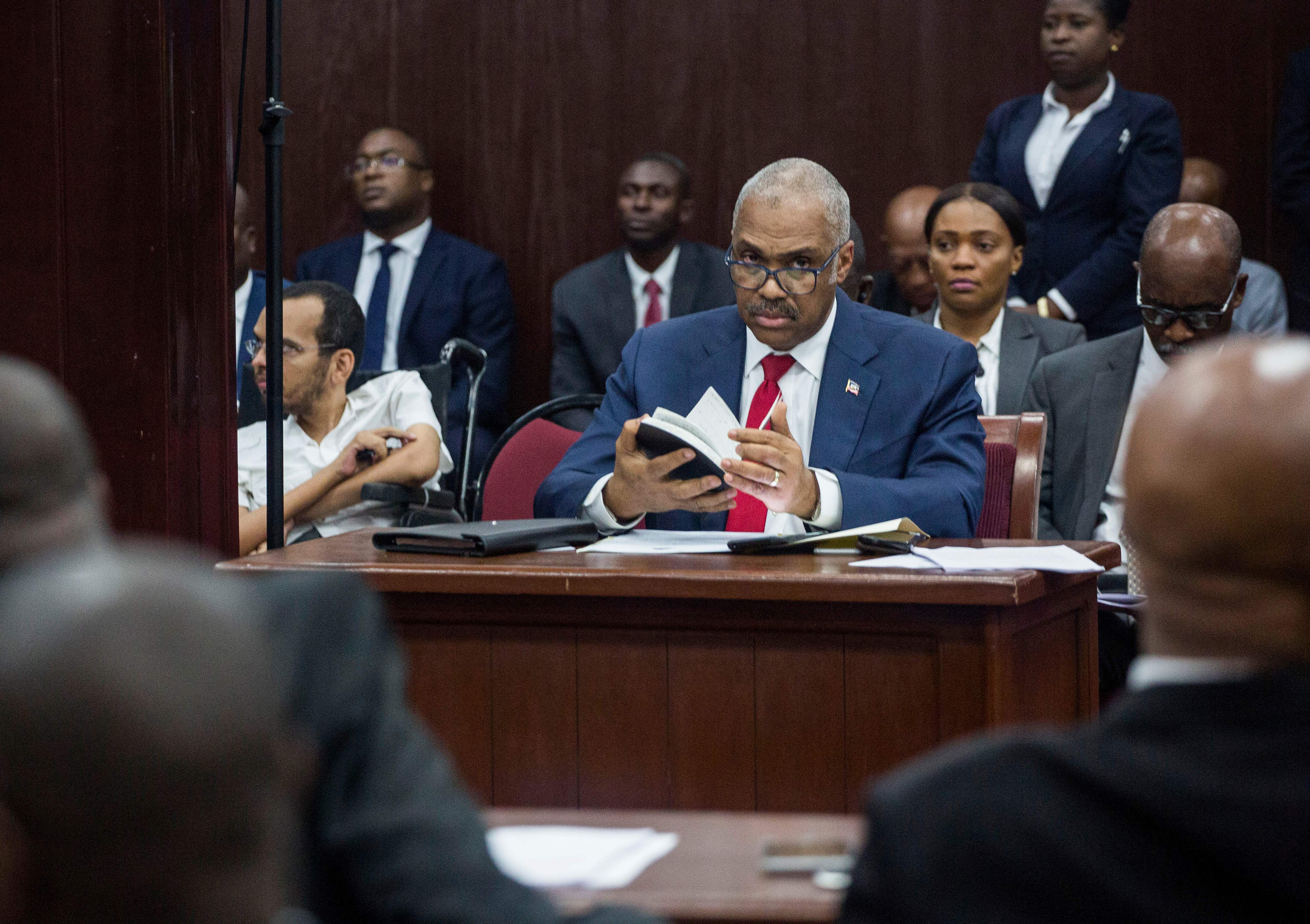 Prime Minister Jack Guy Lafontant in his place in Parliament for the interpellation session at the Chamber of Deputies in Port-au-Prince, Haiti, on July 14, 2018. (PIERRE MICHEL JEAN&mdash;AFP/Getty Images)