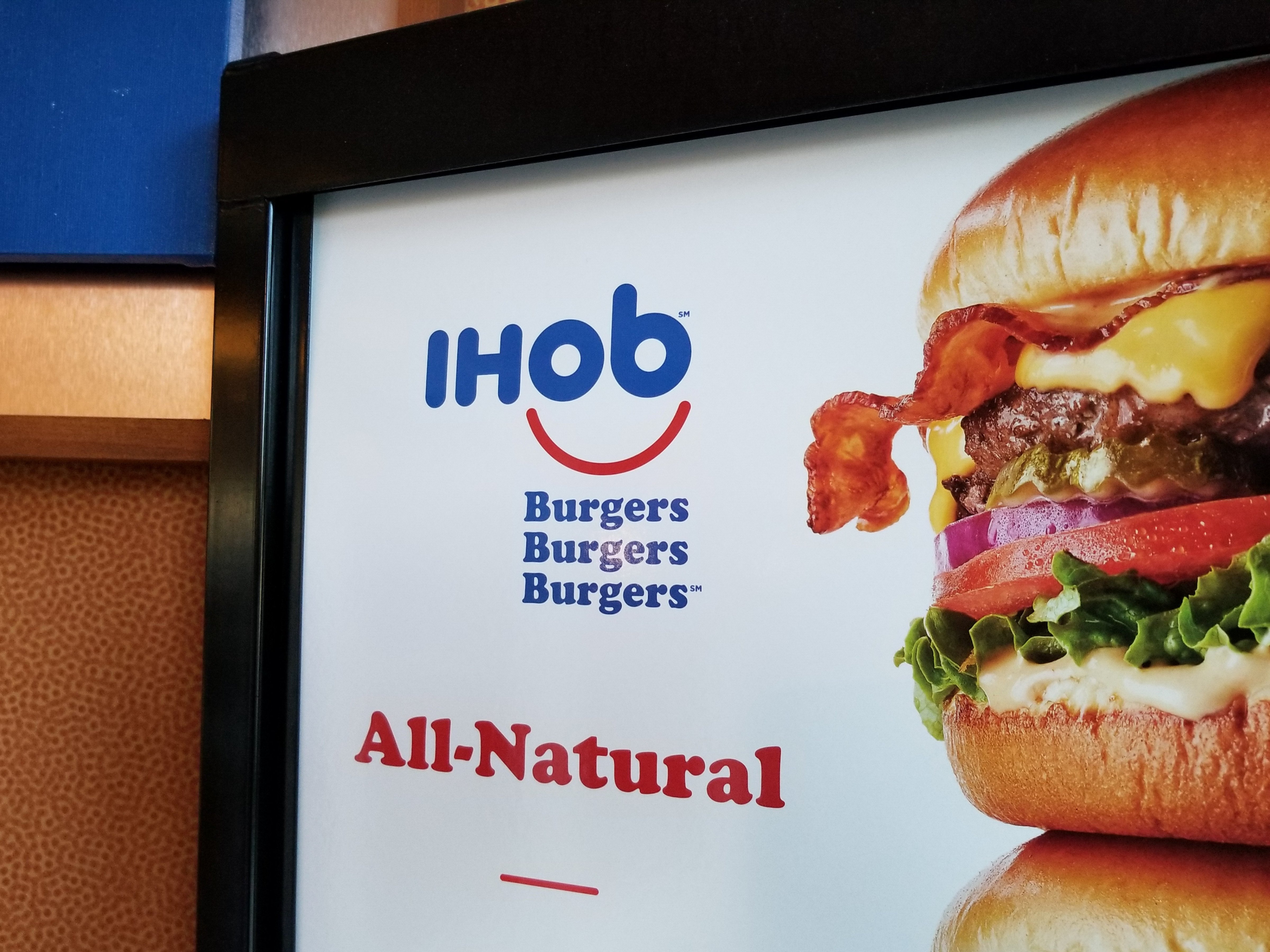 Close-up of sign with IHoB (International House of Burgers) logo, following pancake restaurant International House of Pancake's (IHoP) decision to change its name to IHoB, Dublin, California, June 20, 2018. (Smith Collection/Gado&mdash;Getty Images)