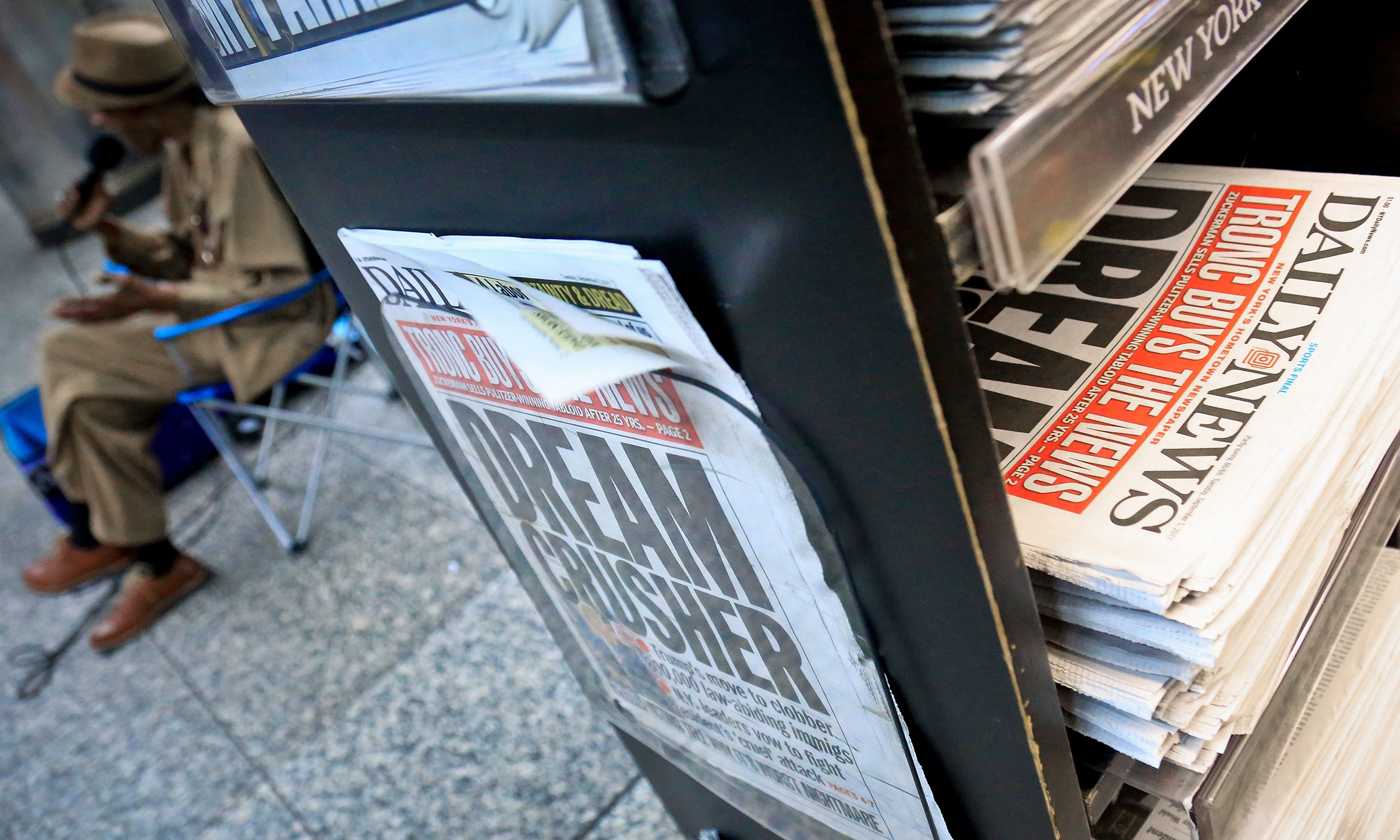 The New York Daily News covered its own sale last fall; the new owner has made drastic cuts (Bebeto Matthews—AP/Shutterstock)