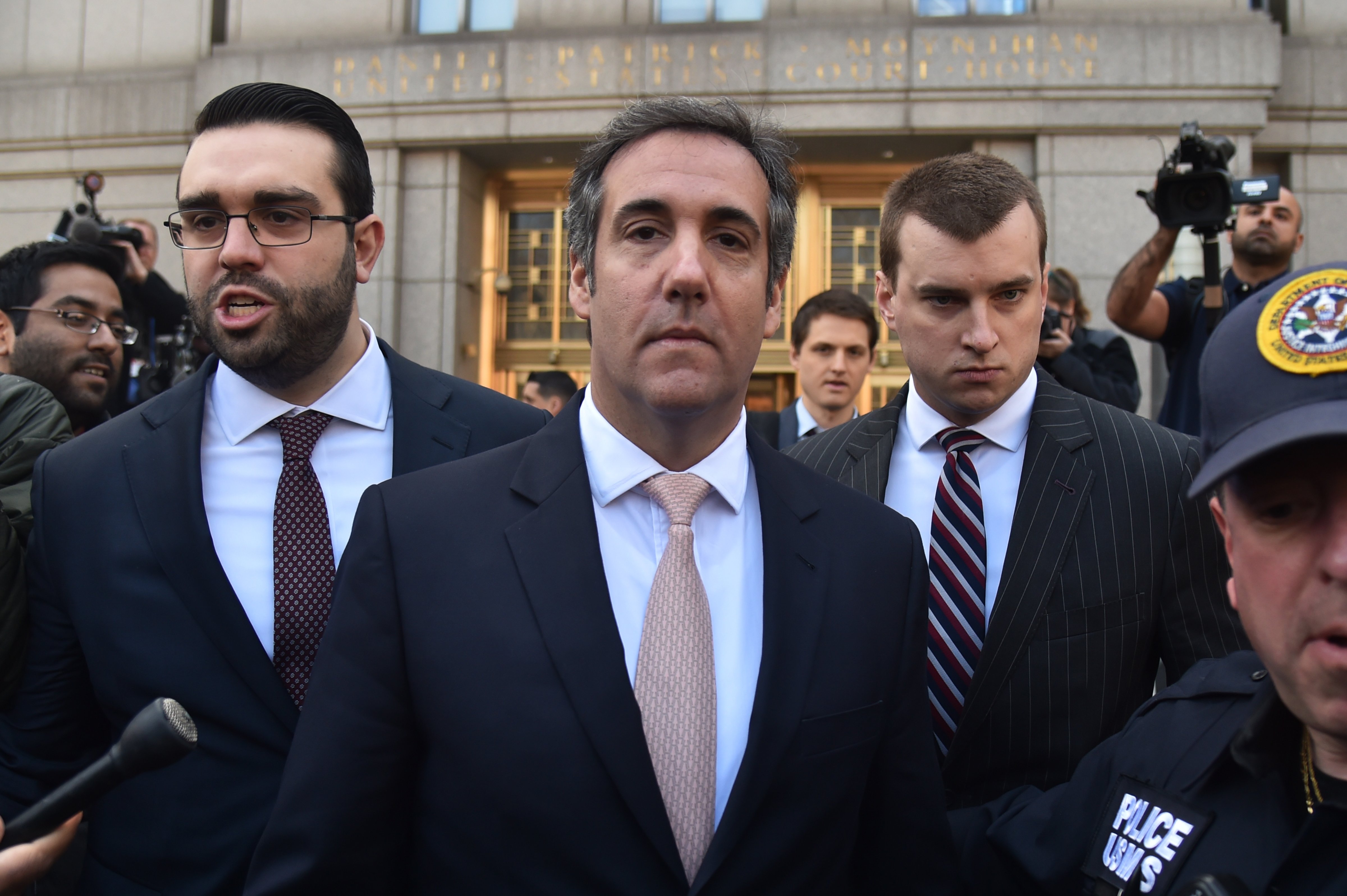 US President Donald Trump's personal lawyer Michael Cohen(C) leaves the US Courthouse in New York on April 26, 2018. (HECTOR RETAMAL&mdash;AFP/Getty Images)