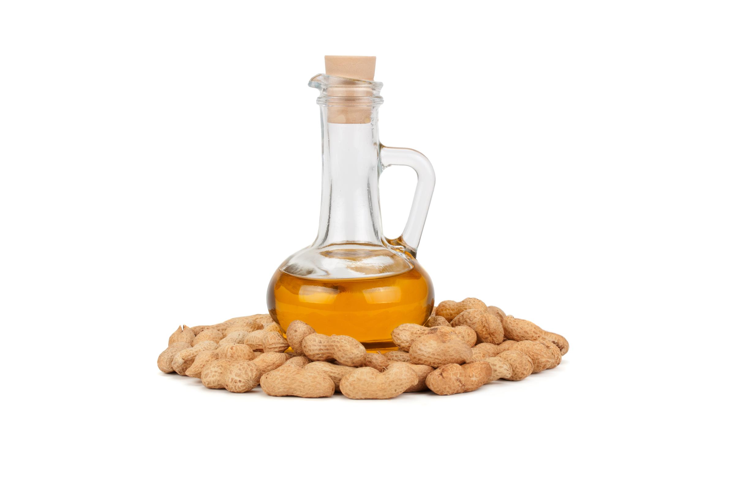 peanuts and oil in bottle