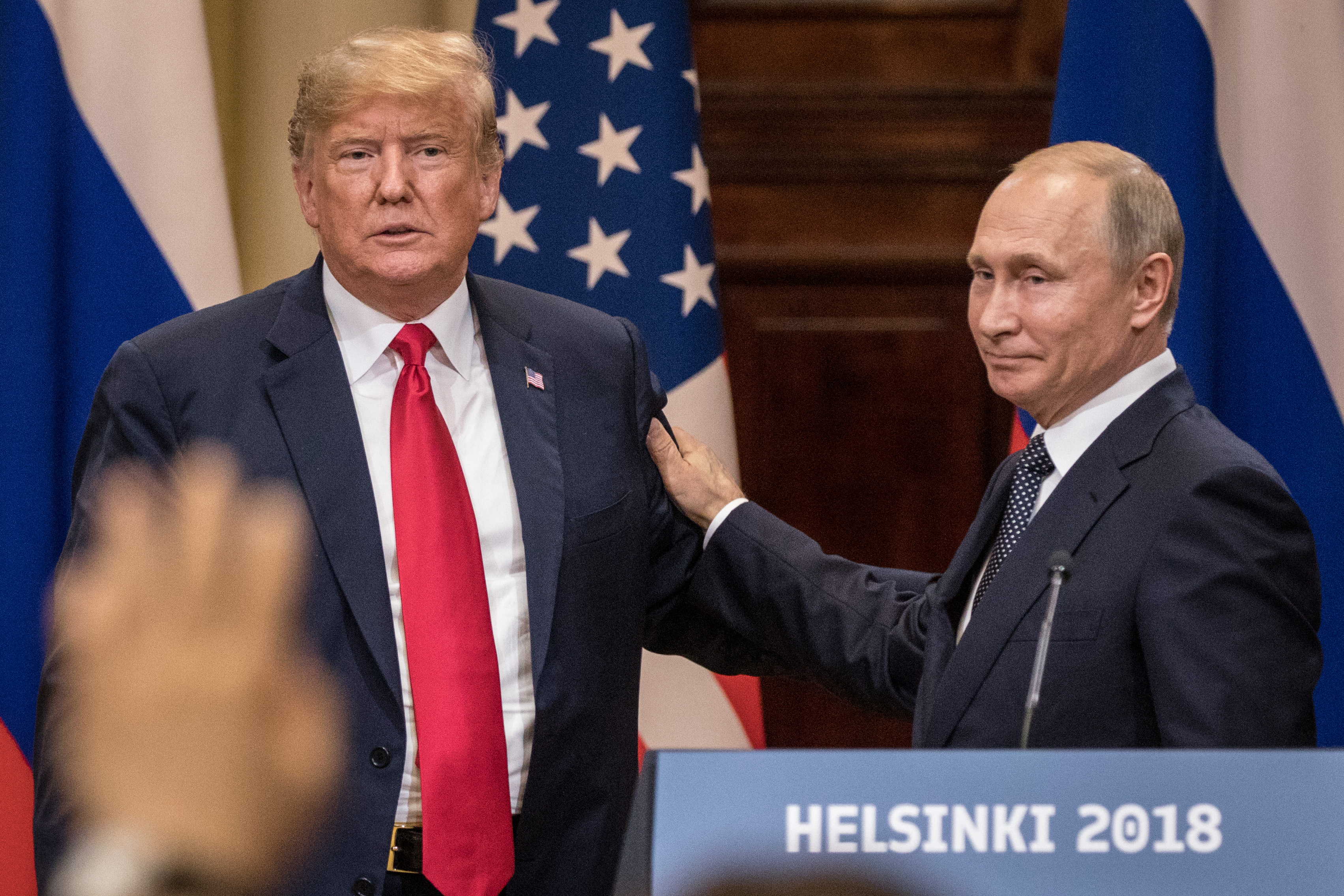 U.S. President Donald Trump (L) and Russian President Vladimir Putin shake hands during a joint press conference after their summit on July 16, 2018 in Helsinki, Finland. The two leaders met one-on-one and discussed a range of issues including the 2016 U.S Election collusion. (Chris McGrath - Getty Images)