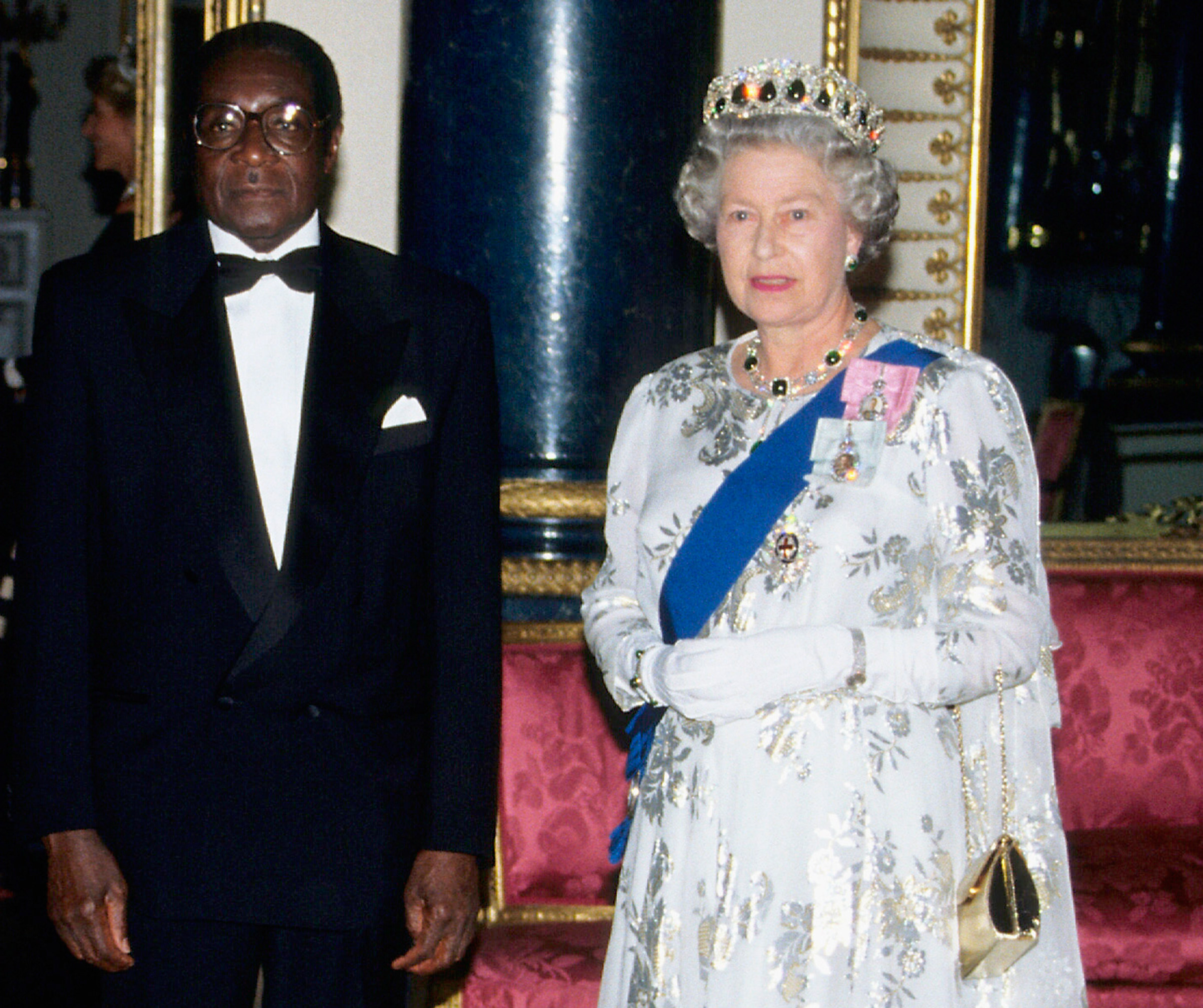 President Robert Mugabe of Zimbabwe and Queen Elizabeth ll at Buckingham Palace, London, during his state visit in May 1994. (Anwar Hussein—Getty Images)