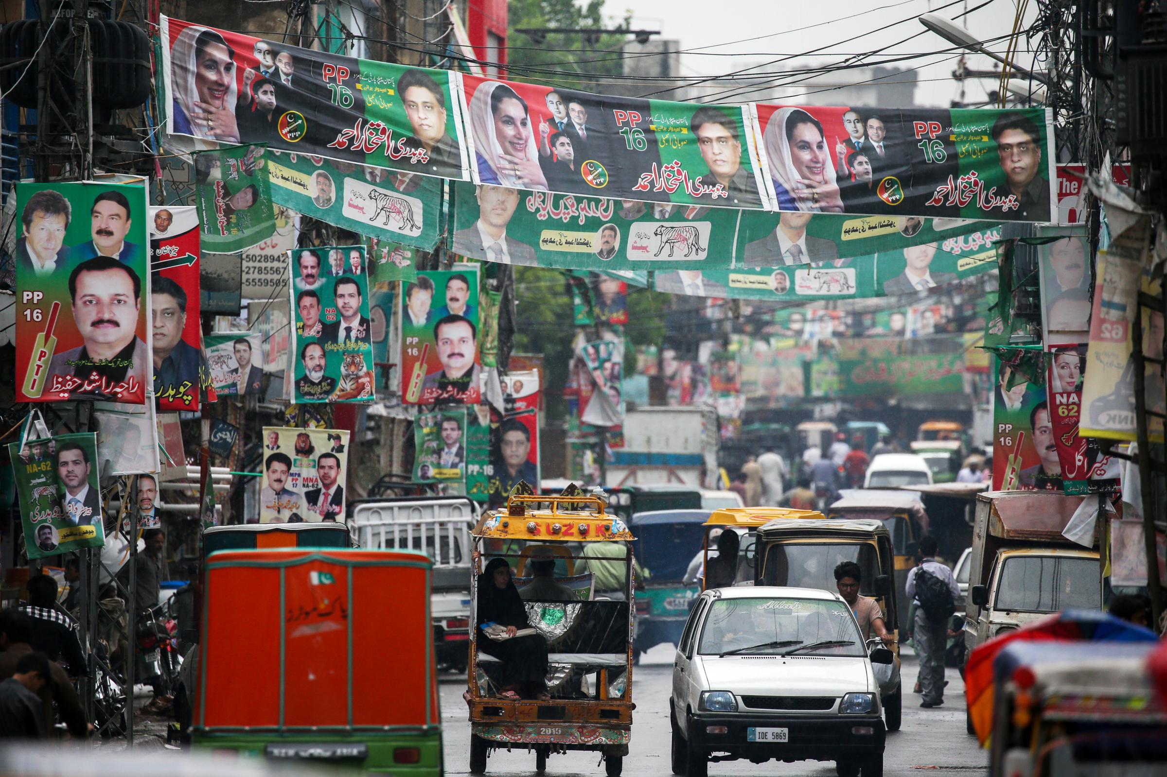 A street is decoreated with flags and banner of political parties ahead of general elections in Rawalpindi