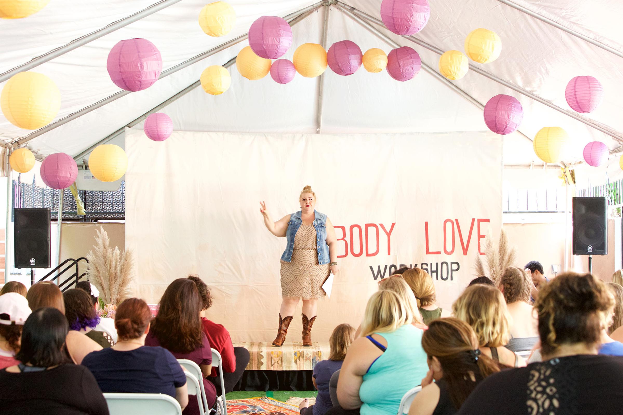 Self-Love Mentor and Wellness Advocate Sarah Sapora speaks at a Body Love workshop