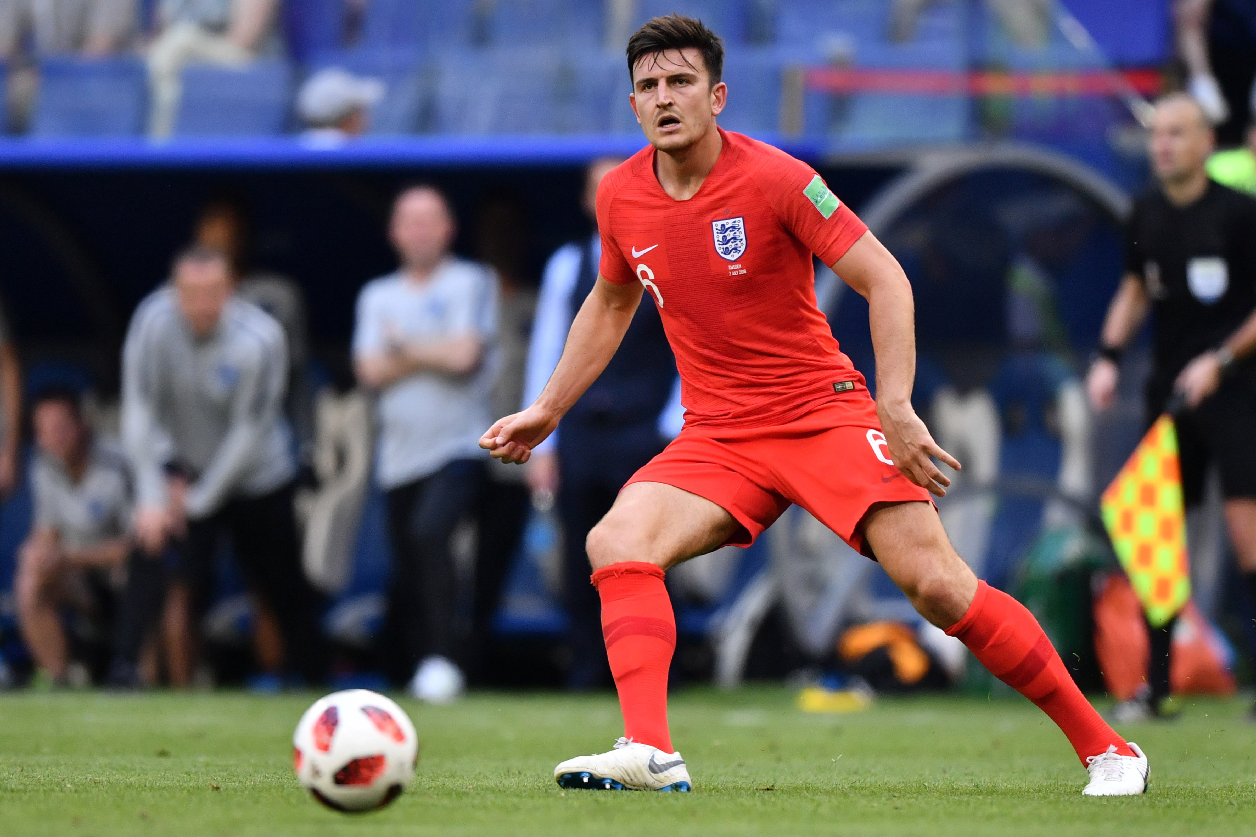 England's defender Harry Maguire drives the ball during the Russia 2018 World Cup quarter-final football match between Sweden and England at the Samara Arena in Samara on July 7, 2018. (FABRICE COFFRINI—AFP/Getty Images)