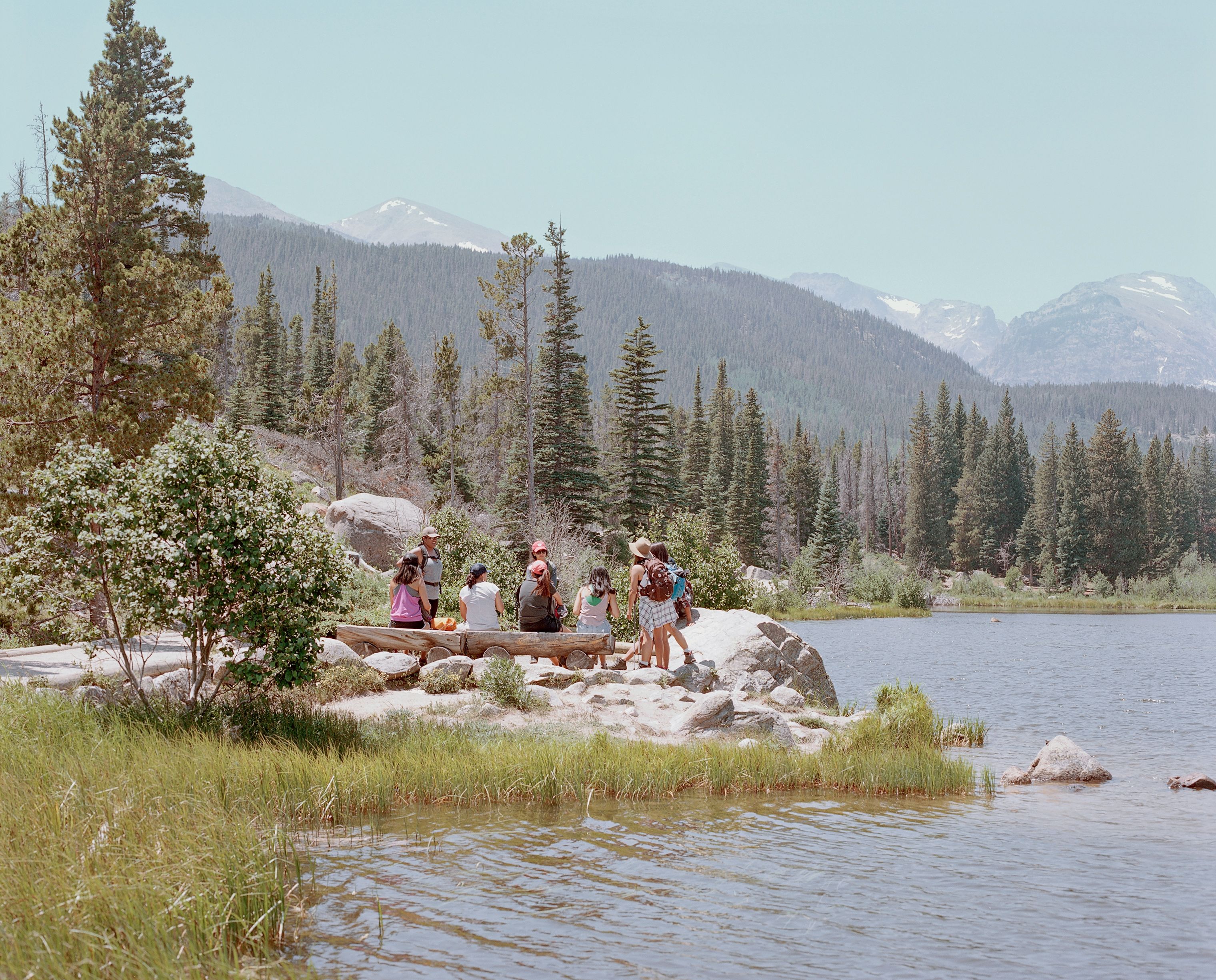 Leaders of Latino Outdoors Colorado practice first aid safety at Sprague Lake in Rocky Mountain National Park, June 29, 2018. (Catherine Hyland for TIME)