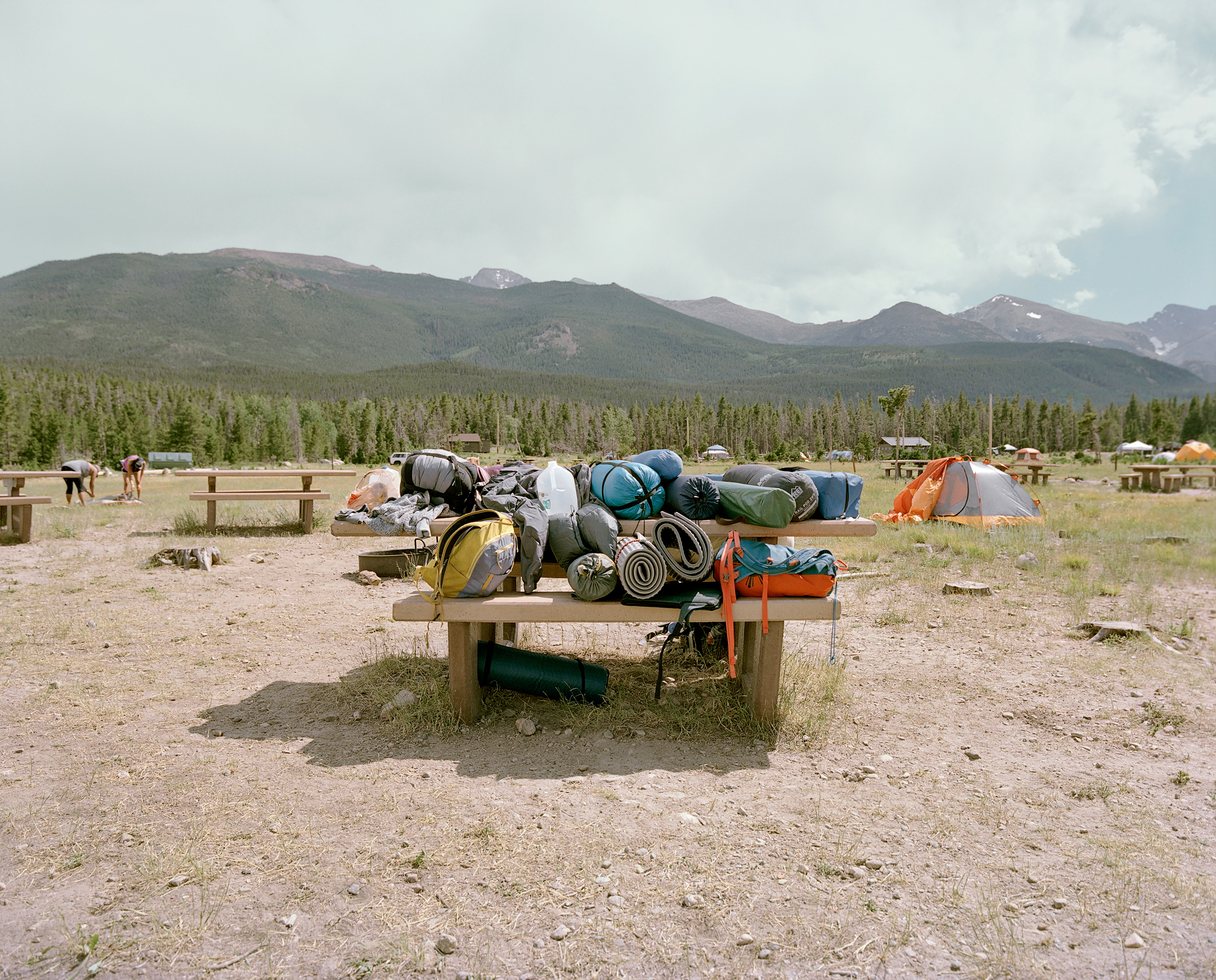 Leaders of Latino Outdoors Colorado set up camp at Glacier Basin Campsite in Rocky Mountain National Park on June 29, 2018. (Catherine Hyland for TIME)