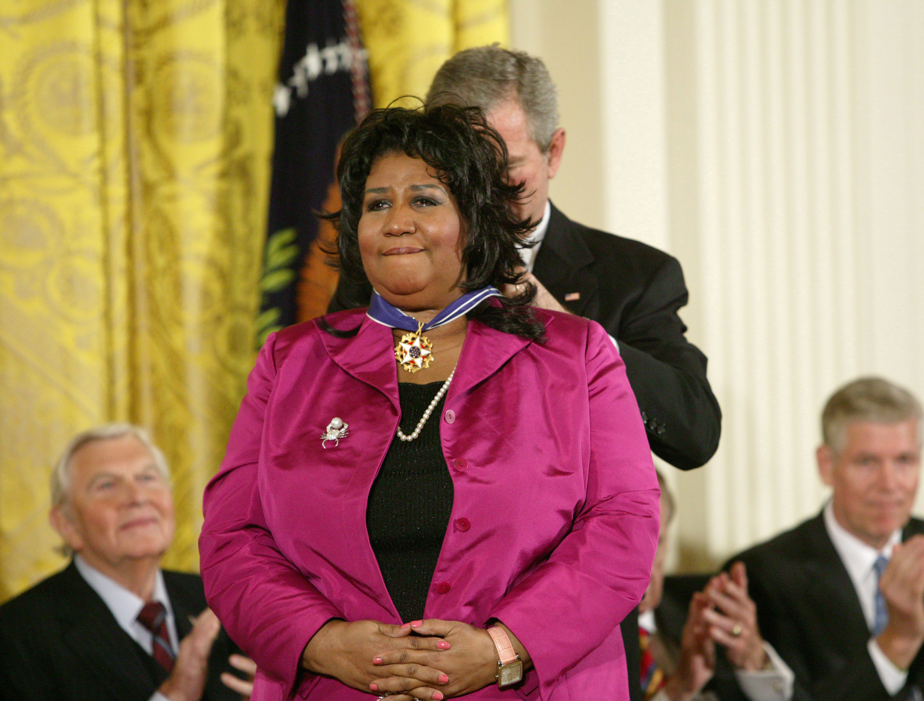 President George W. Bush presents Aretha Franklin with the 2005 Presidential Medal of Freedom at the White House in Washington D.C. on Nov. 9, 2005. (Douglas A. Sonders—Getty Images)