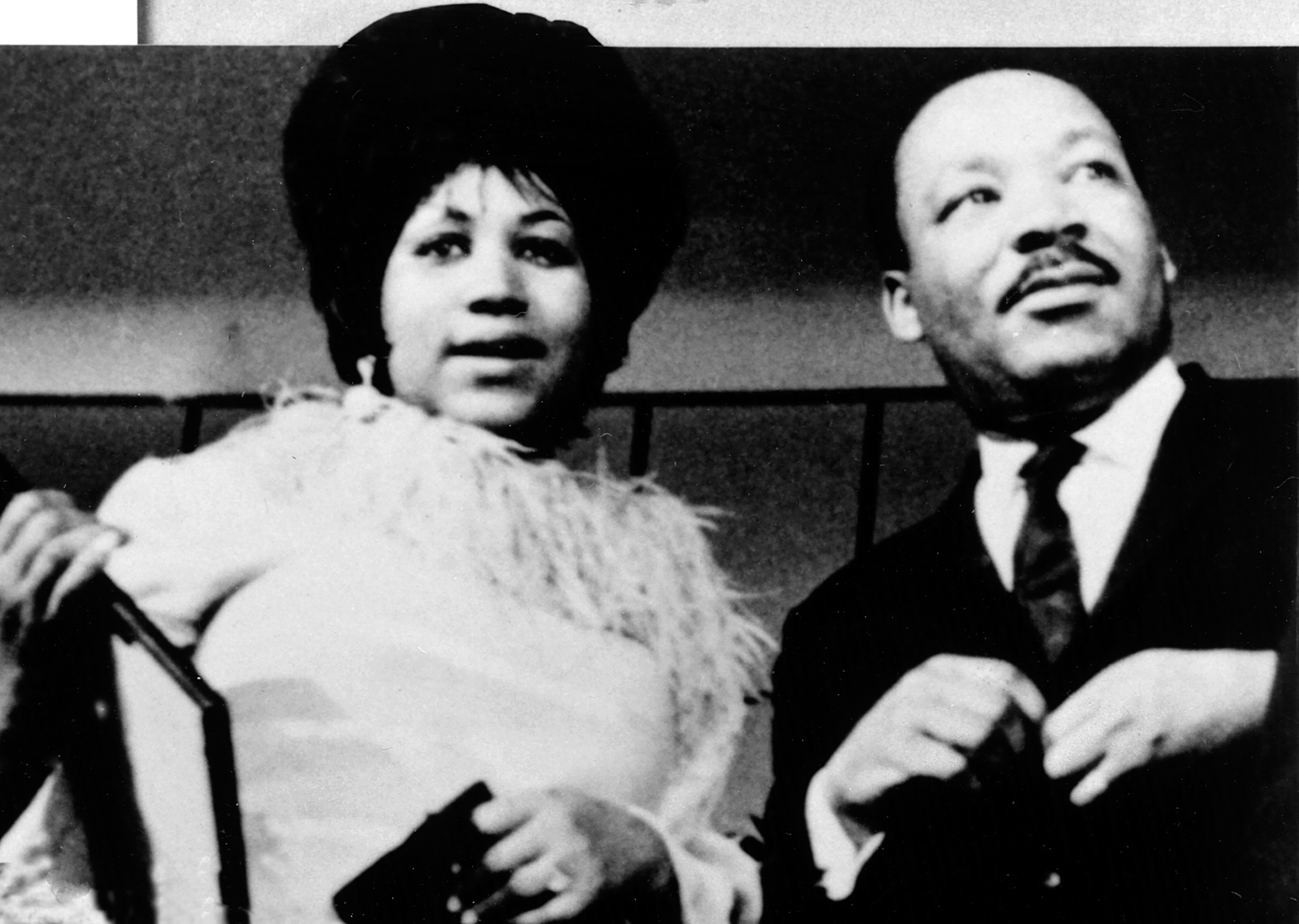 Aretha Franklin and Dr. Martin Luther King Jr. in the late 1960s. (Everett Collection)