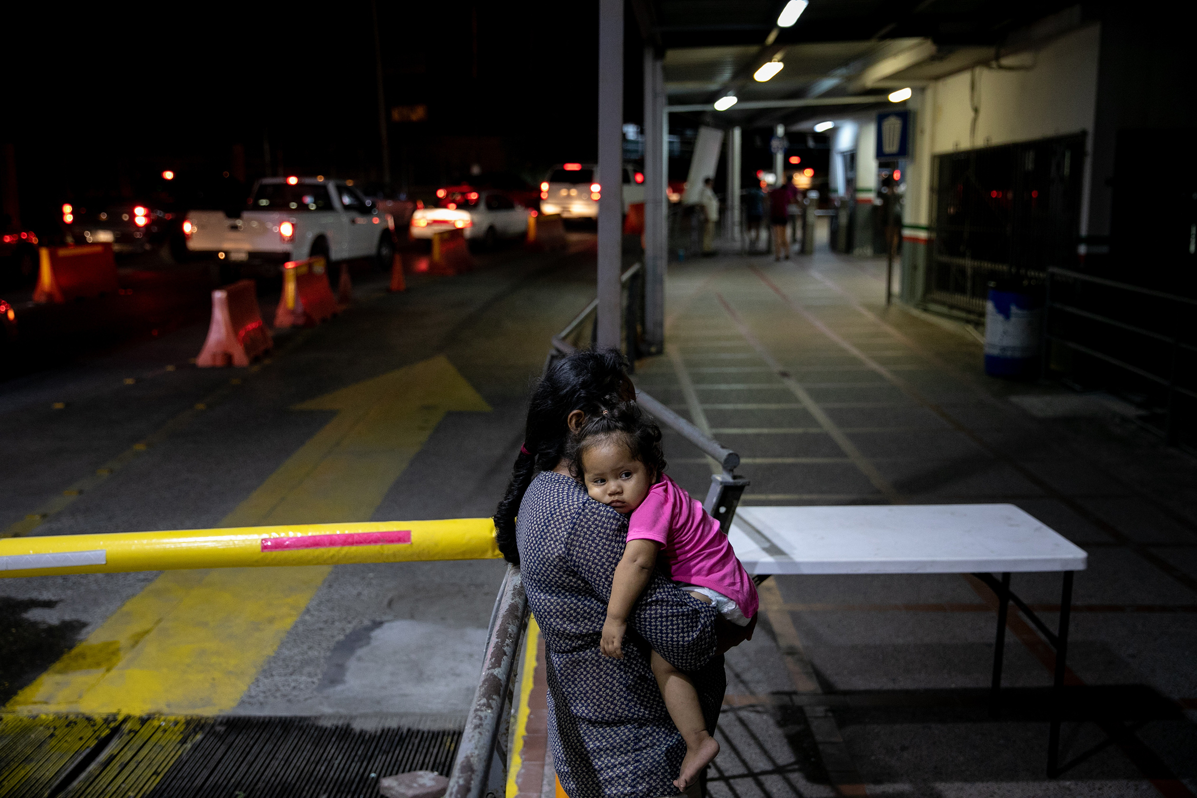 Asylum seekers at the gates to the U.S. face barriers even at official crossings like this bridge in Matamoros, Mexico (Ilana Panich-Linsman for TIME)