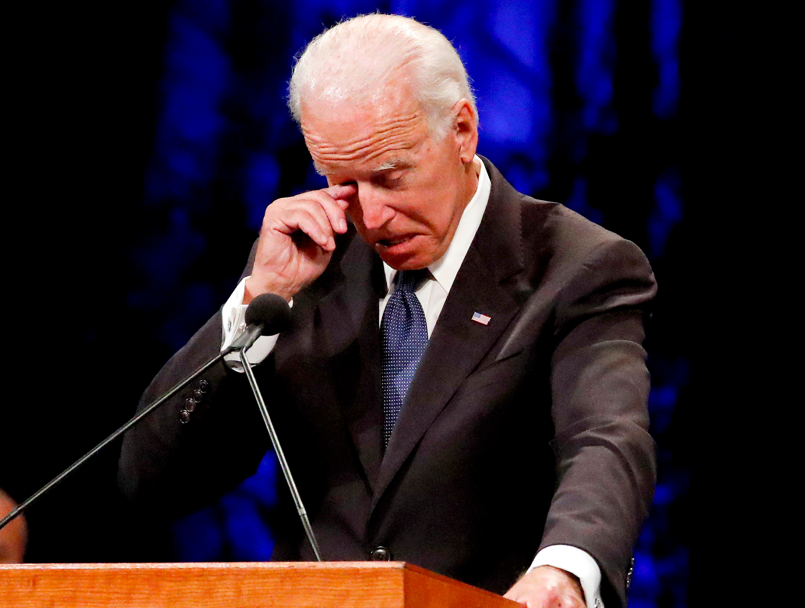 Former Vice President Joe Biden wipes a tear away while giving a tribute during memorial service at North Phoenix Baptist Church for Sen. John McCain on Aug. 30, 2018. (Jae C Hong—AP/REX/Shutterstock)