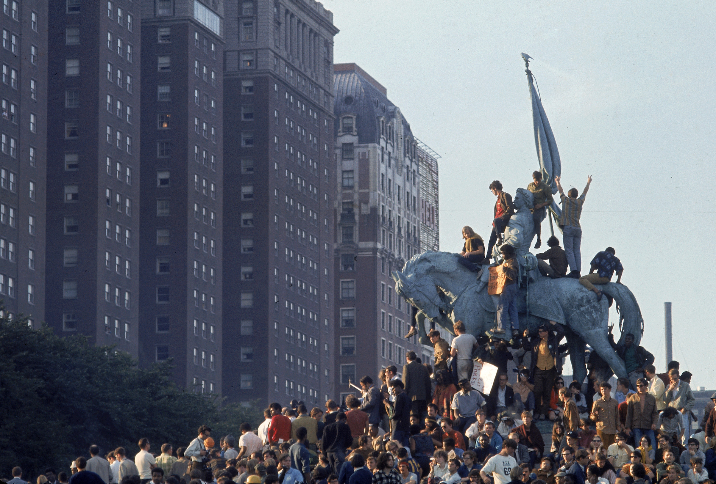 Yippie demonstrators swarming a statue in Grant Park during the 1968 Democratic National Convention. (Julian Wasser—The LIFE Images Collection/Getty Images)