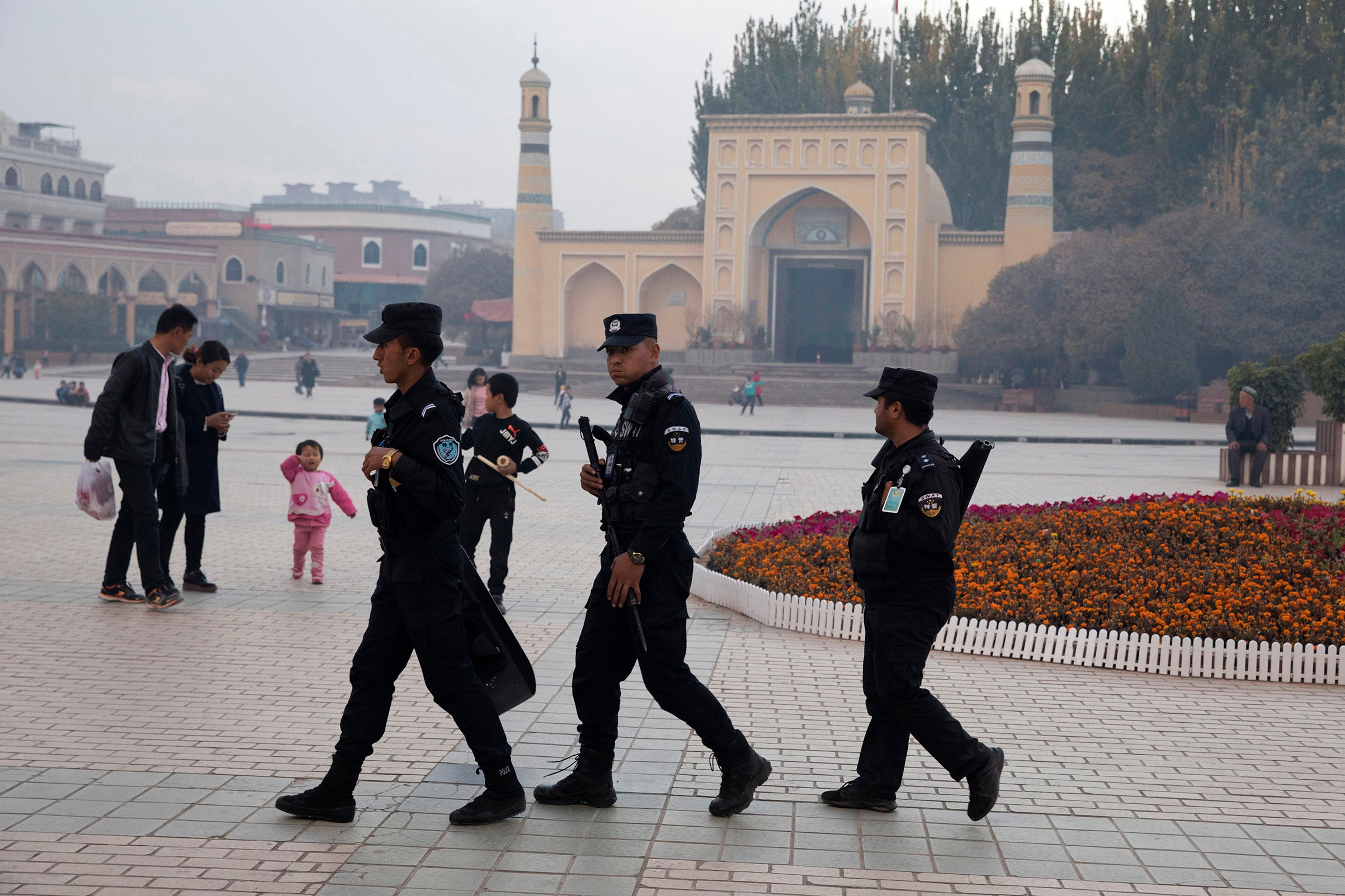 Security personnel patrol near the Id Kah Mosque in western China’s Xinjiang region on Nov. 4 (Ng Han Guan—AP/Shutterstock)