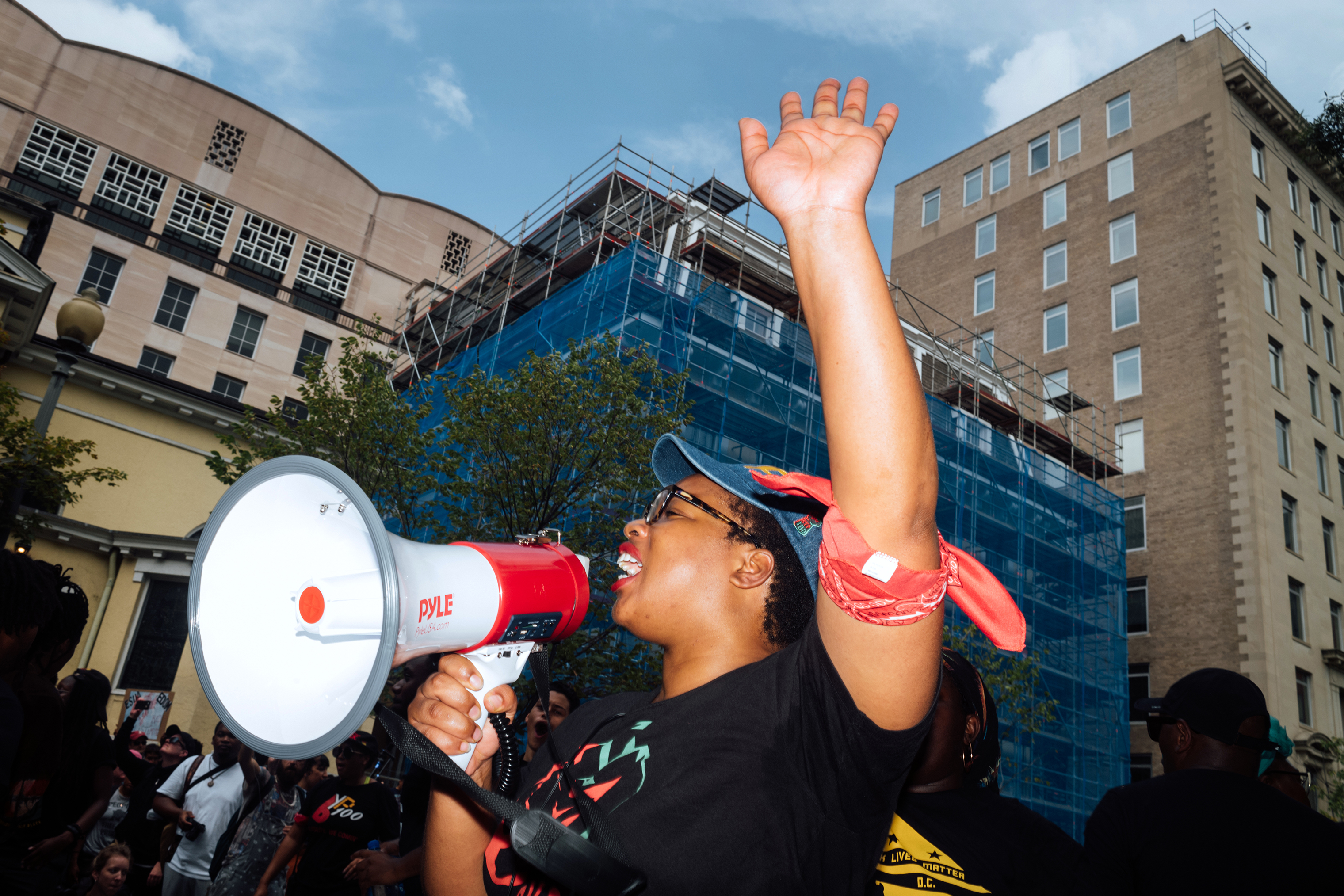 A counter-protester yells into a megaphone. (Daniel Arnold for TIME)