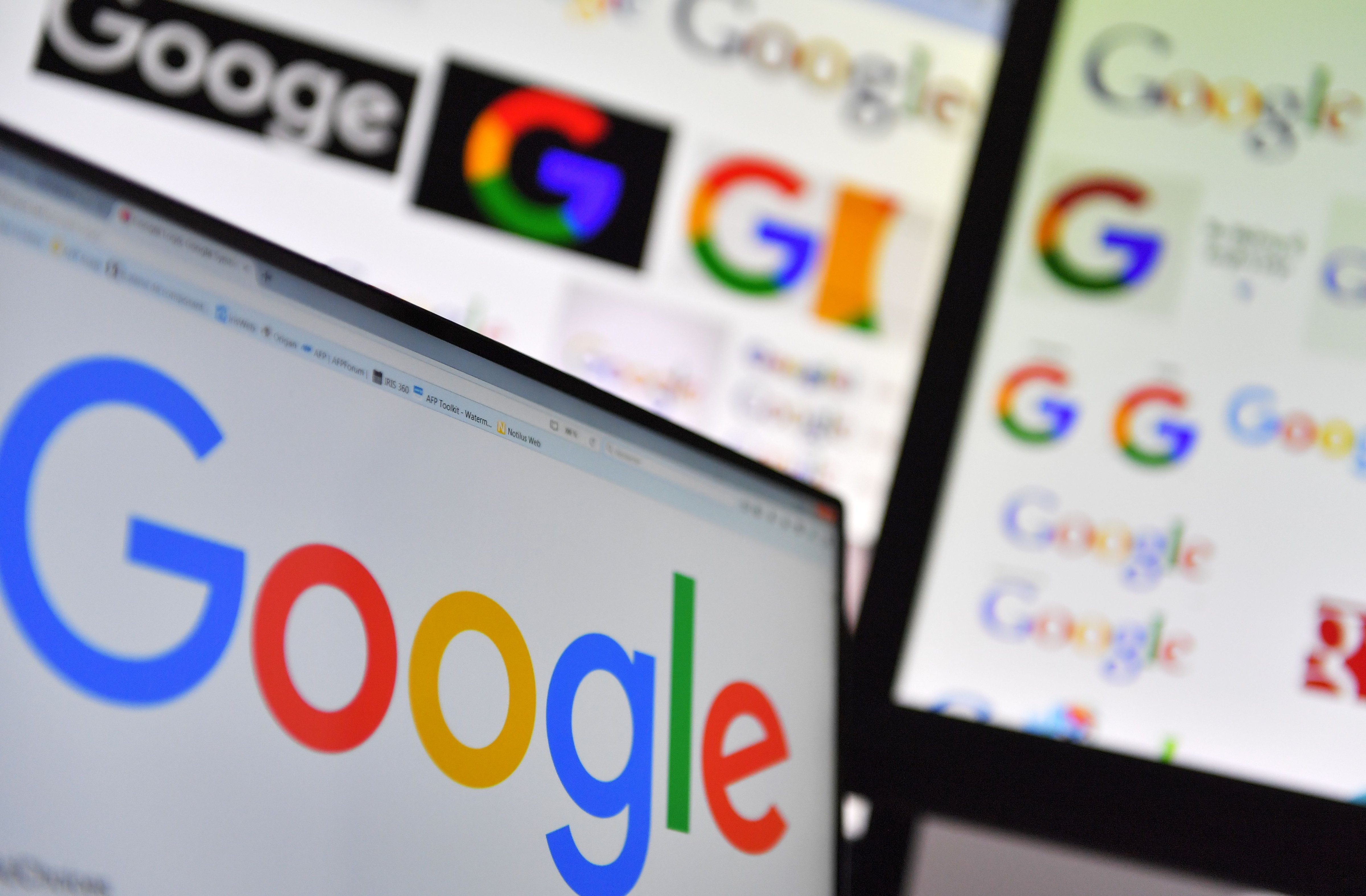 A picture taken on Nov. 20, 2017 shows logos of US multinational technology company Google displayed on computer screens. (Loic Venance&mdash;AFP/Getty Images)