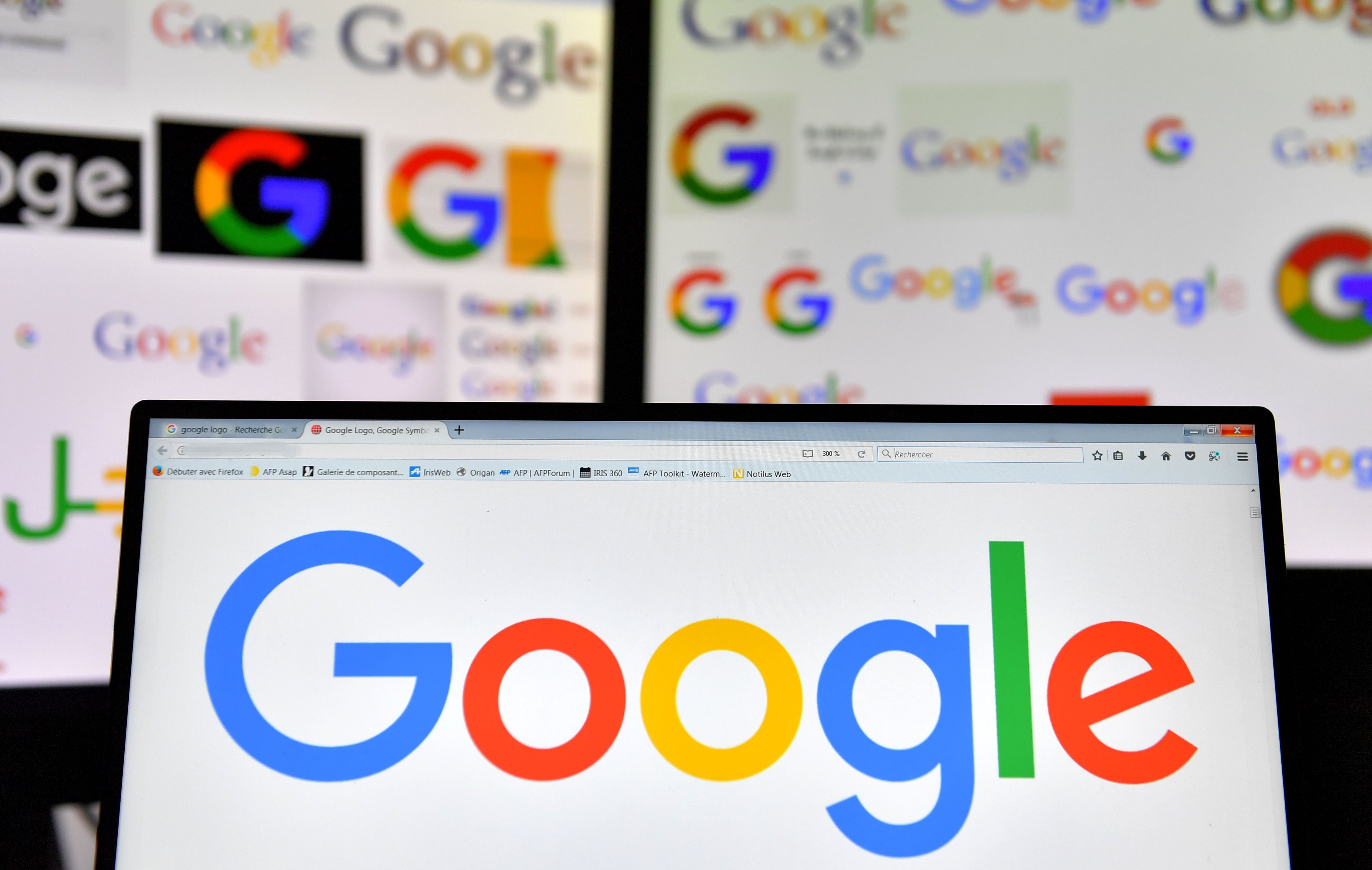 Google's logo is seen displayed on computer screens. (Loic Venance&mdash;AFP/Getty Images)