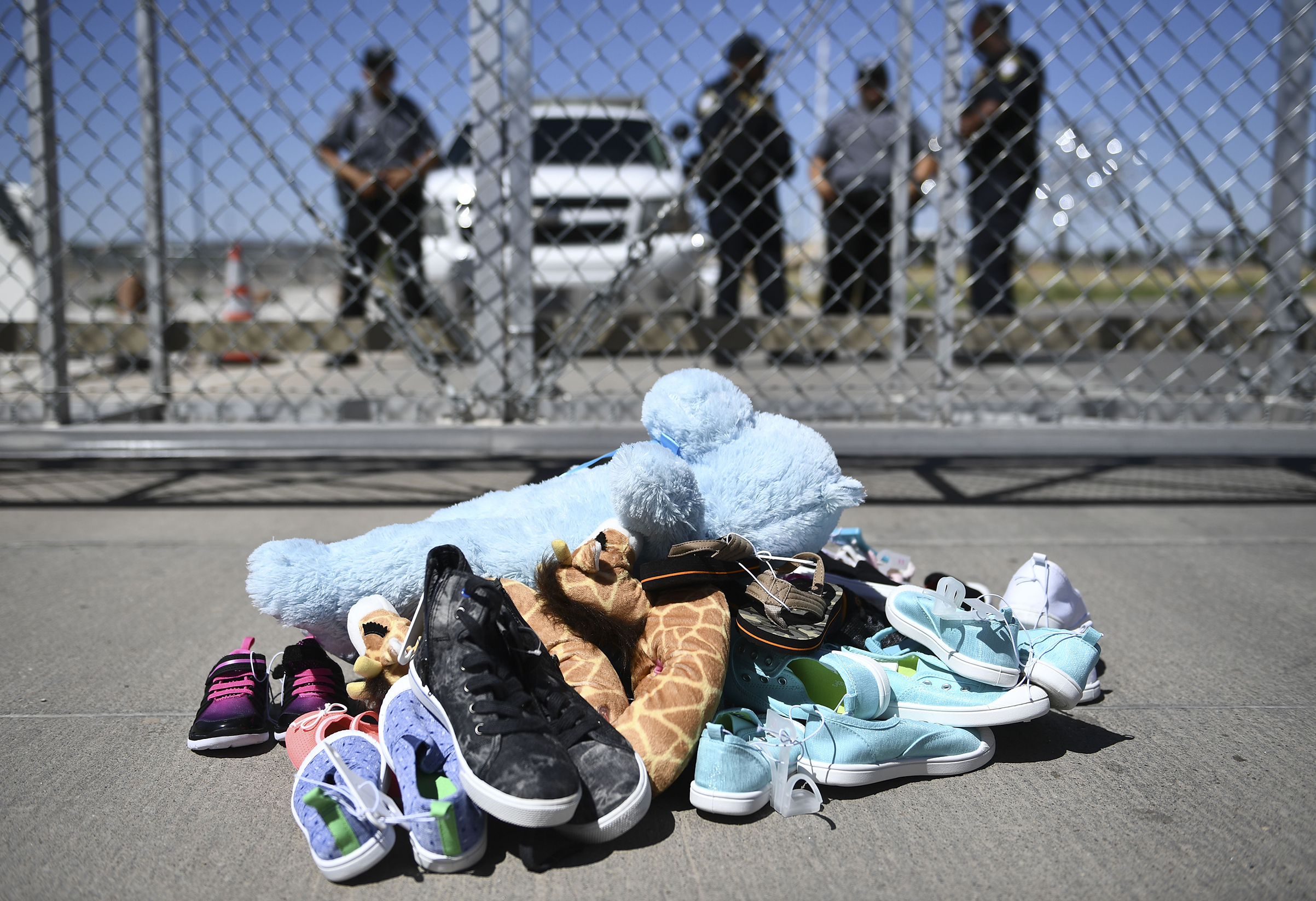 Shoes are left by people at the Tornillo Port of Entry near El Paso, Texas, on June 21, 2018 during a protest rally by several American mayors against the US administration's family separation policy. (Brendan Smialoski—AFP/Getty Images)