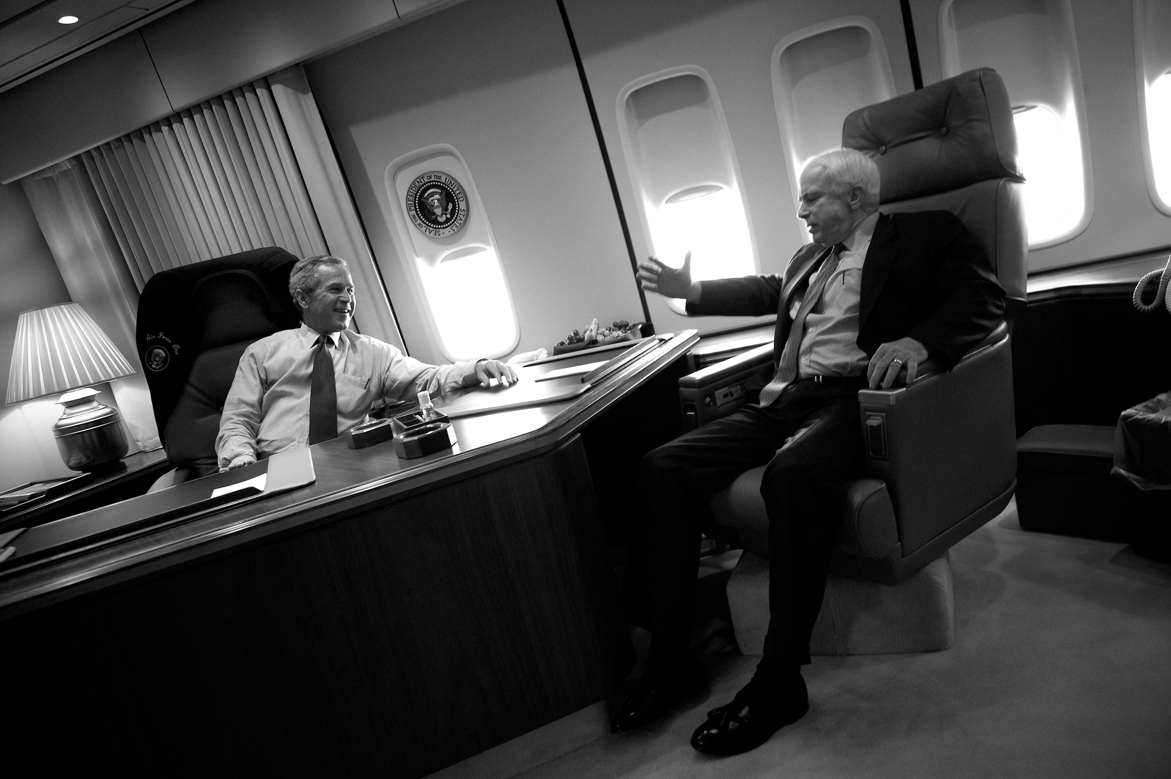 President George W. Bush with Sen. John McCain on board Air Force One on August 11, 2004. (Christopher Morris—VII for TIME)