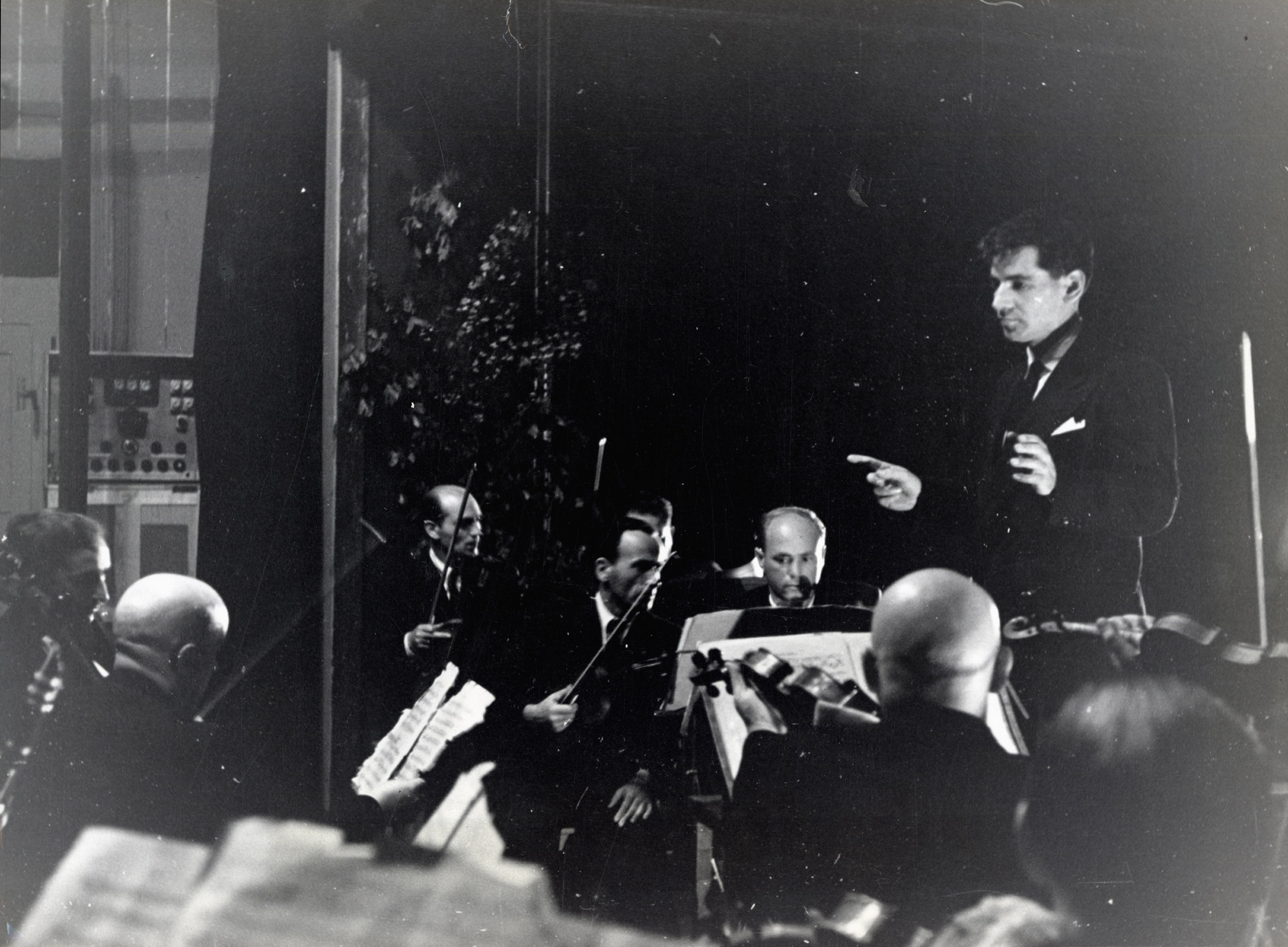 Leonard Bernstein conducting an orchestra of concentration camp survivors for a concert sponsored by the American Jewish Joint Distribution Committee on May 10, 1948, in Munich. (American Jewish Joint Distribution Committee)