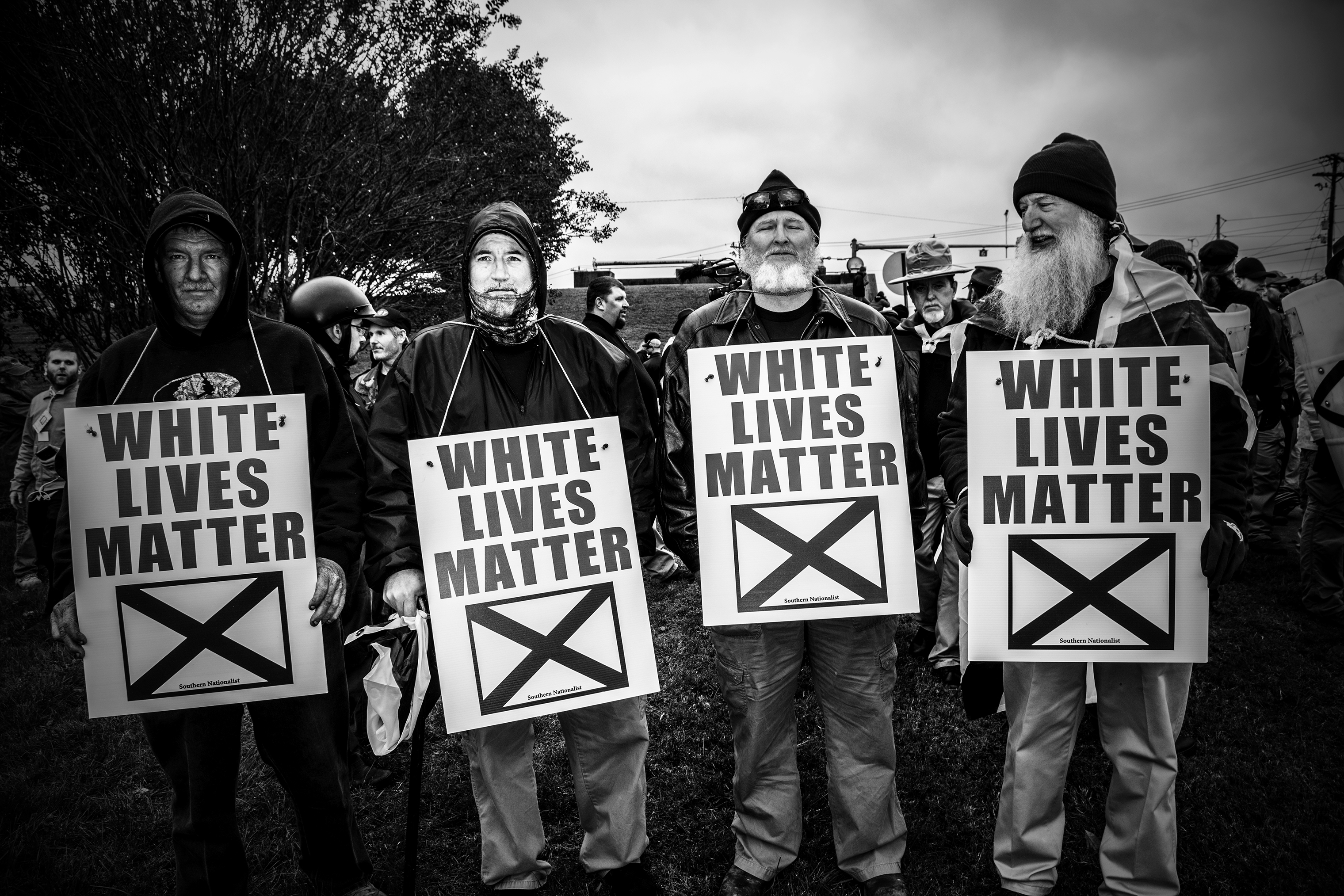 Members of the white supremacist organization League of the South, wear 'White Lives Matter' signs during a rally in Shelbyville, Tenn., on Oct. 28, 2017. (Mark Peterson—Redux)