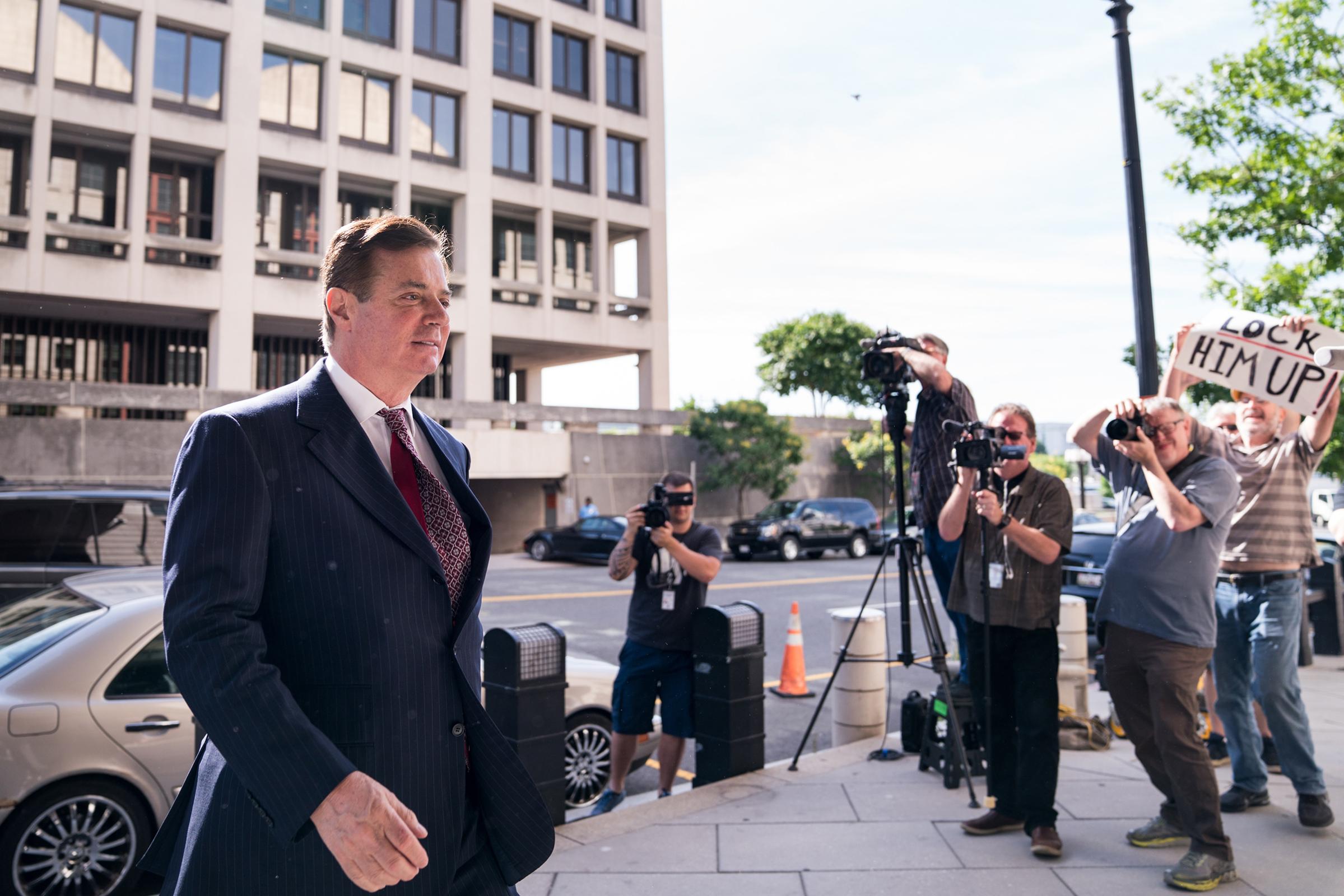Manafort, outside a federal courthouse in Washington in June, was found guilty of eight counts of bank and tax fraud on Aug. 21