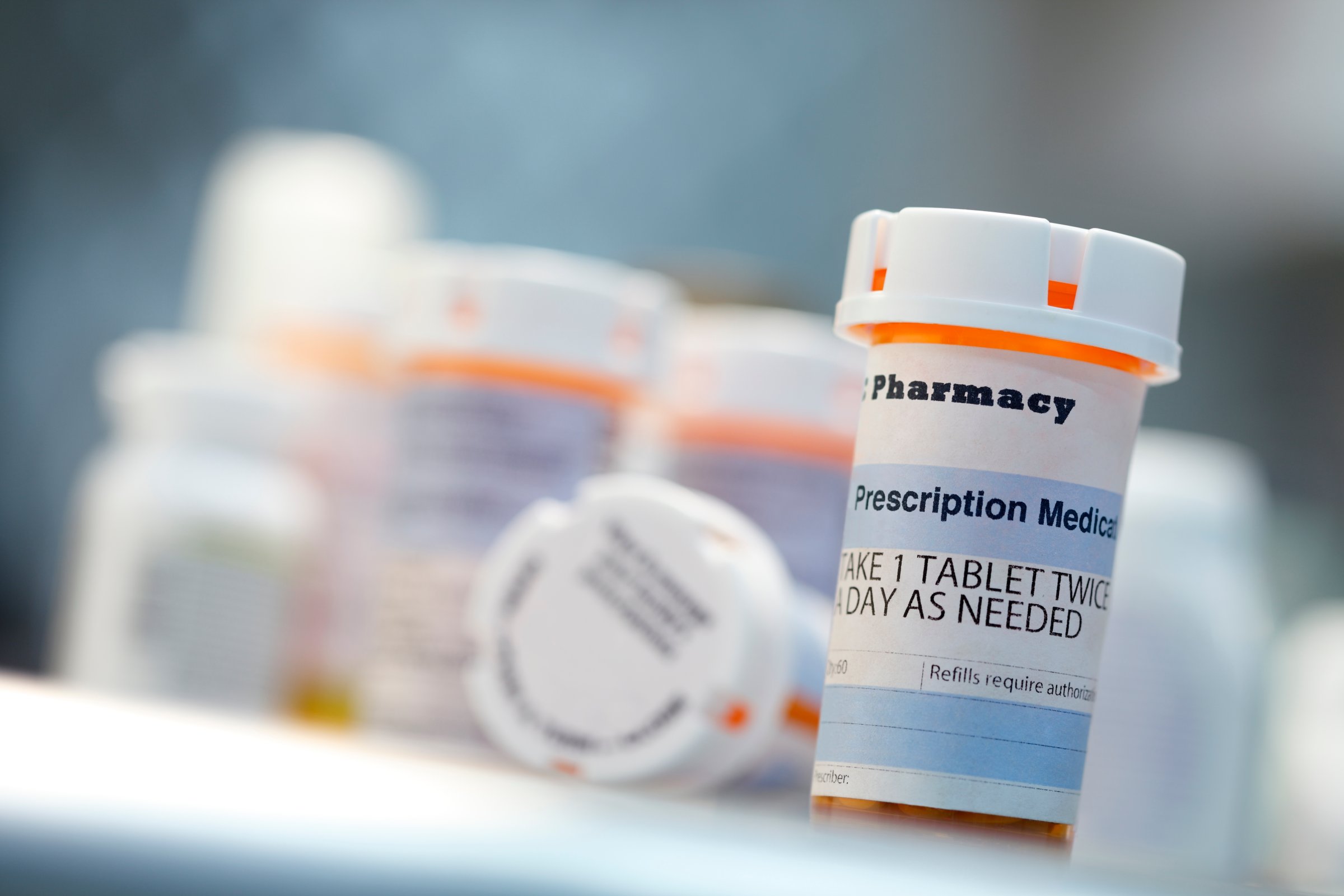 Prescription drug bottles sitting on countertop
