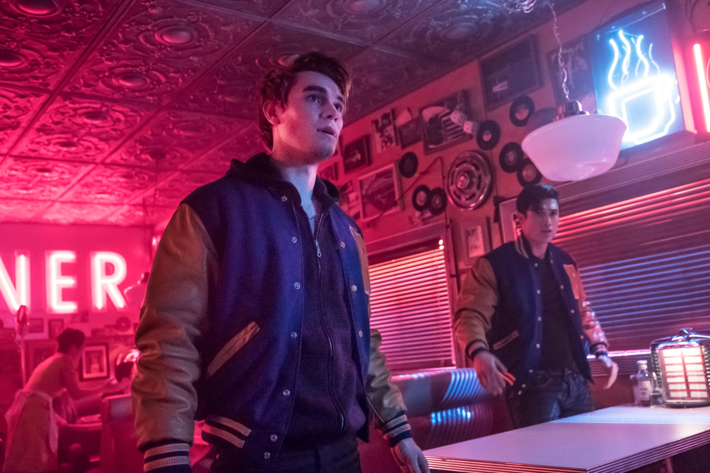 Riverdale -- "Chapter Thirty-Four: Judgment Night" -- Image Number: RVD221b_0134.jpg -- Pictured (L-R): KJ Apa as Archie and Charles Melton as Reggie -- Photo: Katie Yu/The CW -- ÃÂ© 2018 The CW Network, LLC. All Rights Reserved.